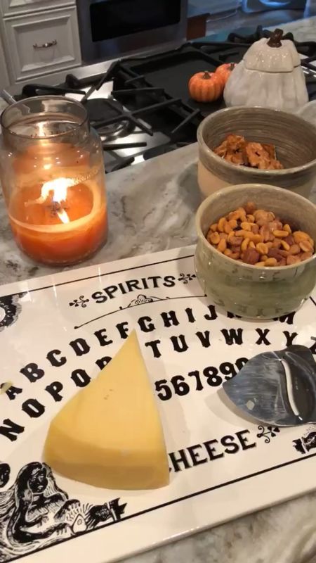 Ouija cheese board! A wedge of cheese 🧀 serves as the planchette! #halloweenentertaining 

#LTKHalloween