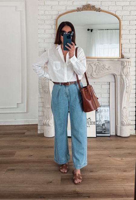 Spring Outfit
Madewell Harlow Denim/ordered petite for ankle length, sized down one. 
Frank and Eileen Button Up/runs large/wearing small 
J.Crew Belt 
Sèzane Farrow Bucket Bag 
Hermes Sandals/ linking similar 

#LTKOver40 #LTKStyleTip