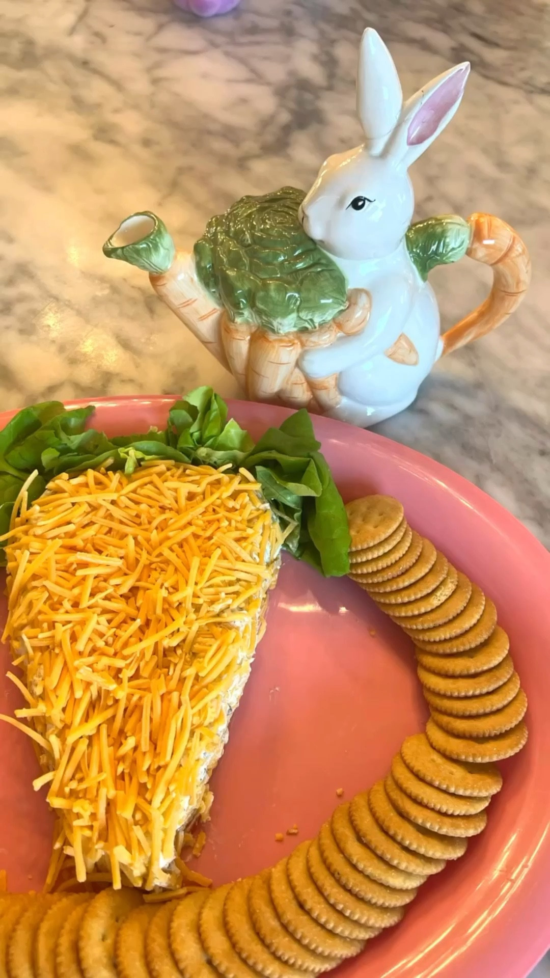 This olive cheeseball is a family favorite and  perfect for upcoming Easter brunches. 

Ingredients:
2 blocks cream cheese, softened
2 cups shredded cheddar cheese (1 cup for mixture, 1 cup for garnish)
1 packet Hidden Valley Ranch seasoning mix
1 heaping cup sliced green olives
Crackers of your choice

Mix cream cheese, shredded cheese, ranch seasoning, and green olives together. Put into the fridge for about 20-30 minutes to set up. You can shape it into so many different things - an egg or a carrot would be perfect for Easter! Add rest of cheese, garnish of your choice, and serve with crackers.