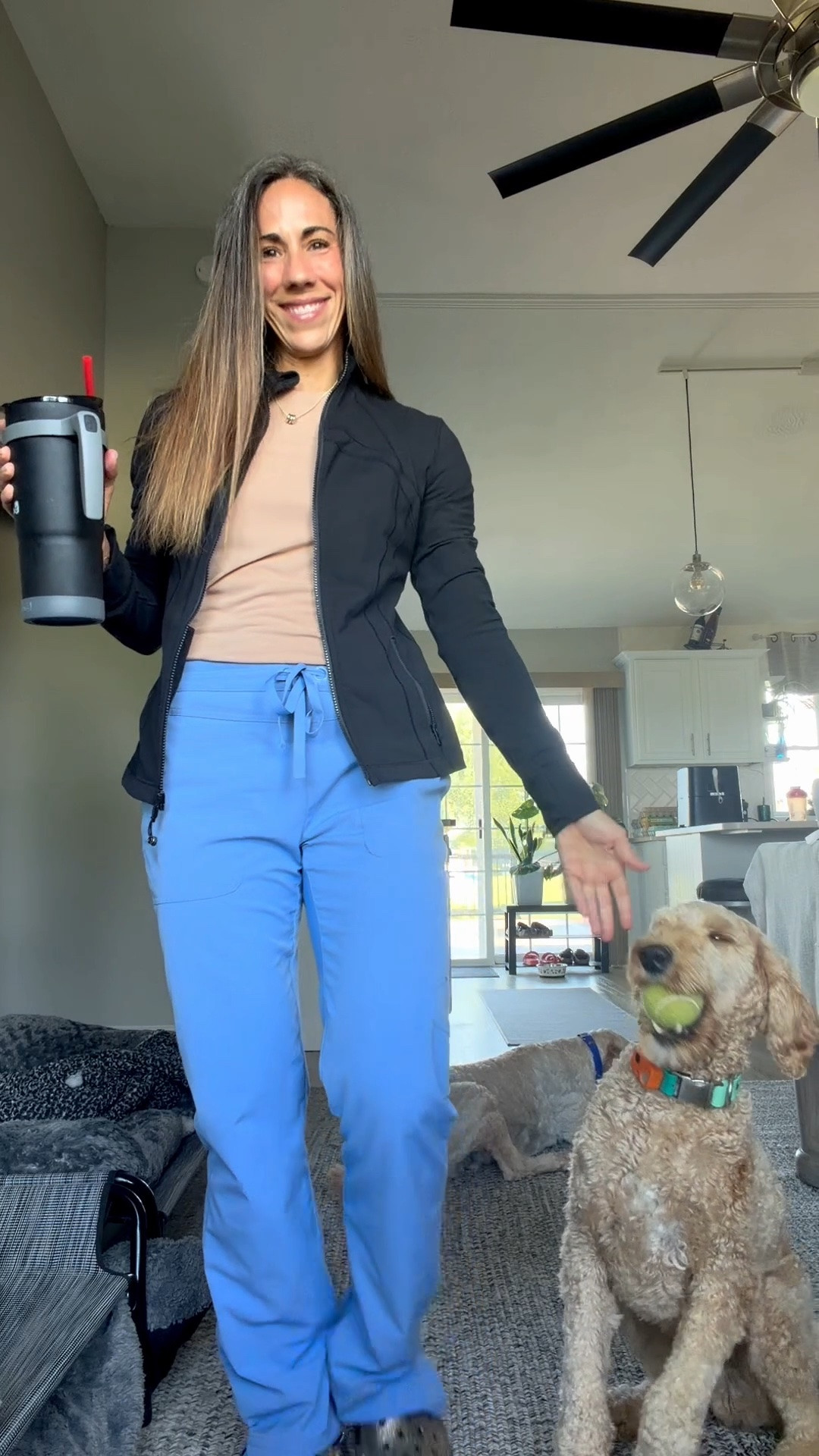 POV: you’re trying to film an outfit and your dog has other plans. 😂🐶🎾 Honestly, Archie understood the assignment.

Also, can we talk about these scrub pants with a regular tee + jacket? This is exactly how I like my workwear: comfortable enough for clinic, but still looks like an outfit. 💙

Pants: XS Tall
T-shirt: Small
Jacket: 8
Shoes: 9
Everything linked ✨

#Workwear #Scrubs #Over40 #WorkwearStyle #ScrubStyle #NursePractitioner #HealthcareStyle #CasualWorkwear @lululemon @crocs

#LTKootd #LTKOver40 #LTKWorkwear