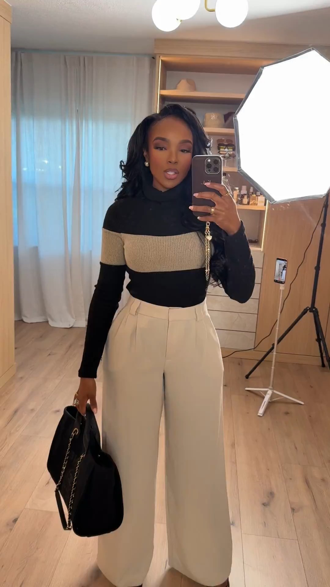 A polished neutral look that balances structure and softness perfectly. The color-blocked knit adds interest while still feeling timeless, and these tailored wide-leg trousers elevate the entire outfit into a true capsule-wardrobe staple. This is the kind of set you can restyle endlessly, which means the cost per wear keeps dropping with every use.

Wear it to the office, meetings, brunch, or dress it up with heels for dinner — it transitions effortlessly from day to night.

Save this post to come back to it when you need a refined, easy outfit that always works.

📏 Sizing:
Wearing size Small  
Height: 5’4”  
Weight: 138 lbs  
Bust: 34D  
Waist: 27”  
Hips: 40”

Perfect if you’re searching for neutral outfit ideas, office-appropriate looks, elevated basics, wide-leg trousers, and chic everyday outfits that feel modern and timeless.

Follow me on Instagram and YouTube @kirasfashionfinds 

#LTKPetite #LTKWorkwear #LTKootd