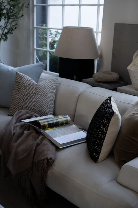 OMG this living room is giving calm, classic, and chic!!! I love the books, the textures, the glow from the candles. EEK it feels like a designer home but still so livable.  

 #LTKSpringSale #LTKSeasonal #LTKHome
