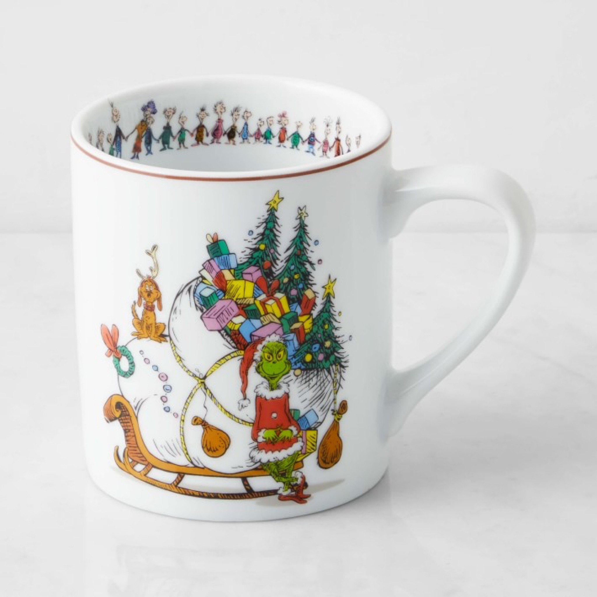 Even the Grinch™ can't resist coffee, tea and cocoa served in these charming mugs. Crafted of porcelain, the pieces display colorful portraits of the Grinch from Dr. Seuss' whimsical portraits in How the Grinch Stole Christmas™. The residents of Whoville are arrayed around the inside rim. 

#LTKSeasonal #LTKunder50 #LTKHoliday