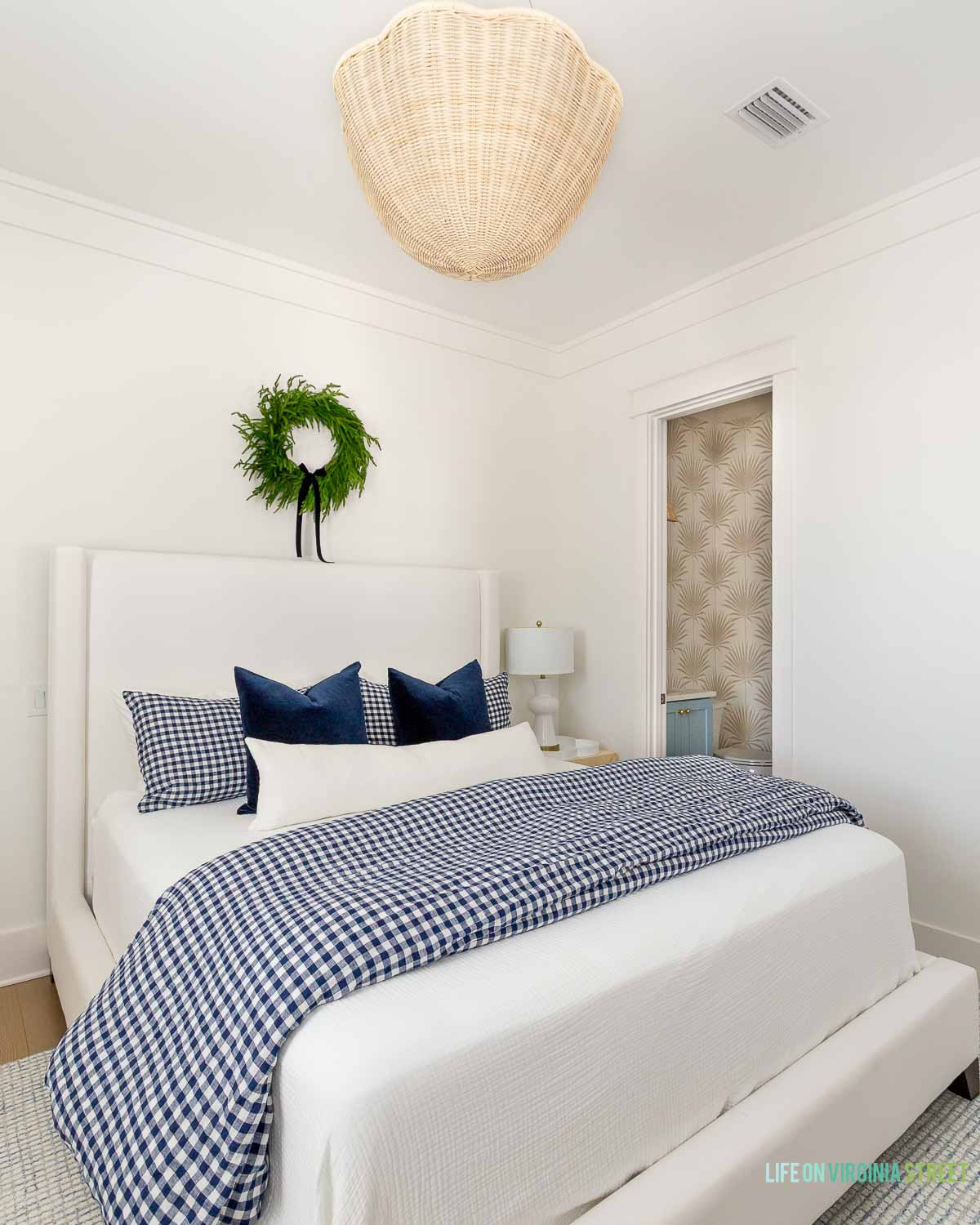 Holiday guest bedroom // Christmas holiday decor // wreath // chandelier // Ralph Lauren style Christmas  

 #LTKHoliday #LTKSeasonal #LTKHome