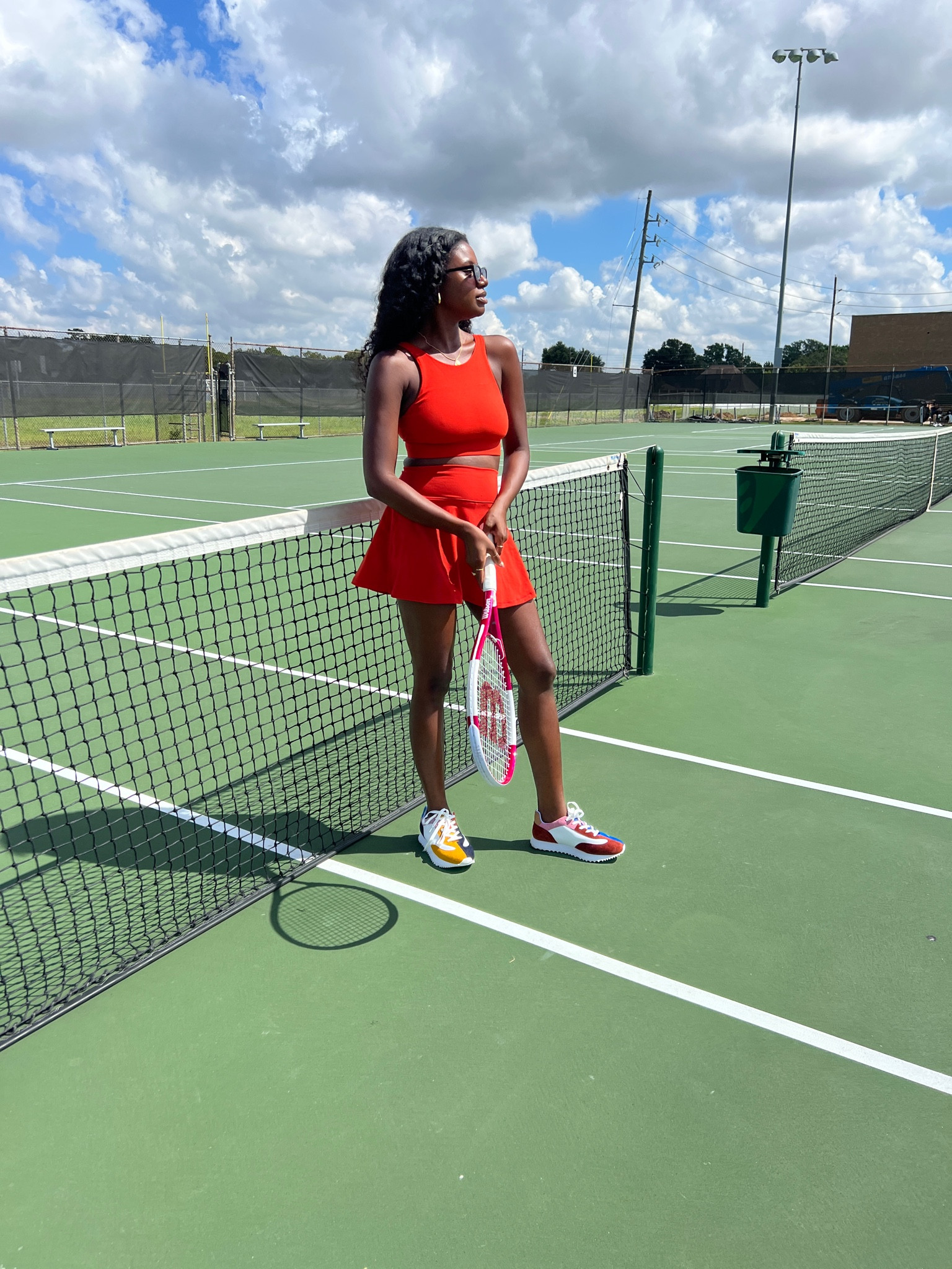 Outdoor or travel look! High neck sport bra, tennis skirt with built in shorts

#LTKtravel #LTKfit #LTKunder100