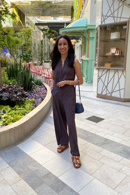 Vacation outfit. Spring outfit  Jumpsuit is a great one to dress up or down. The material is a lightweight athleisure type and doesn’t really wrinkle, so it is a great option for travel. I have and love the plain wide leg style of this jumpsuit from last year too. This new option has utility pockets and drawstrings at the ankles to also wear them cinched like joggers. Currently on sale for 25% off. Size down if in between; I am also in the petite at 5’4. 


#LTKtravel #LTKover40 #LTKsalealert