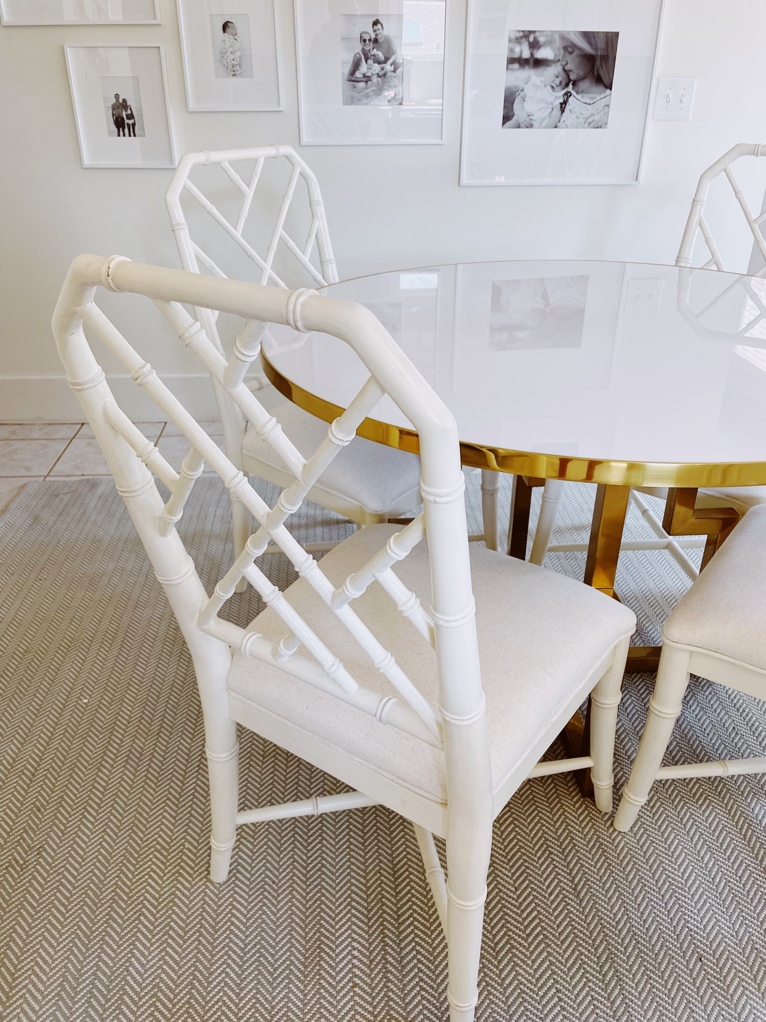 My kitchen is finally coming together! Satin brass kitchen table with white chippendale chairs. cb2 gallery frames with white mats on the wall. I linked the dupe of my kitchen chairs as well as the ones I have. Also linked my light blue kitchen rug (indoor outdoor so easy to clean) and chandelier 

Chippendale bay chair, white kitchen chairs, White Rattan Dining Chair

Light blue herringbone rug, indoor outdoor rug, kitchen rug, low profile rug

Gallery frames, gallery wall, Modern History Center Table - White Acrylic, white acrylic kitchen table, breakfast table, round white center table, round white breakfast table, 

