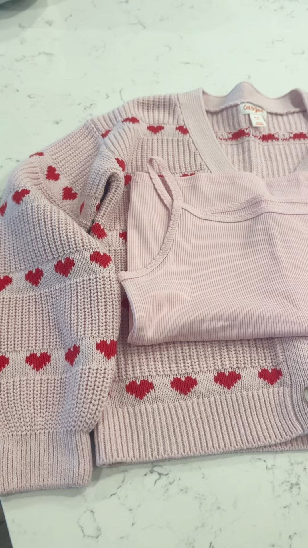 Valentine’s outfits that can actually be worn more than once 💘
I loved this heart sweater so much that I added the tank underneath so she can wear it open or closed. The red + pink with the repeating heart pattern is just adorable, and it’s comfy enough for school days too.

I finished the look with this red skirt from Art Class at Target but it’s from last year so I linked one with hearts from this year that is so cute!
For reference, my 8-year-old is wearing size 8 in the sweater and tank.

Everything is linked here so you can grab the pieces or mix and match 💕



girls Valentine outfit, kids Valentine sweater, girls heart sweater, Target girls skirt, Art Class Target girls, girls Valentine Day outfit, kids school outfit, girls red skirt, Valentine outfit for kids #TargetStyle 

#LTKValentine #LTKKids #LTKSeasonal