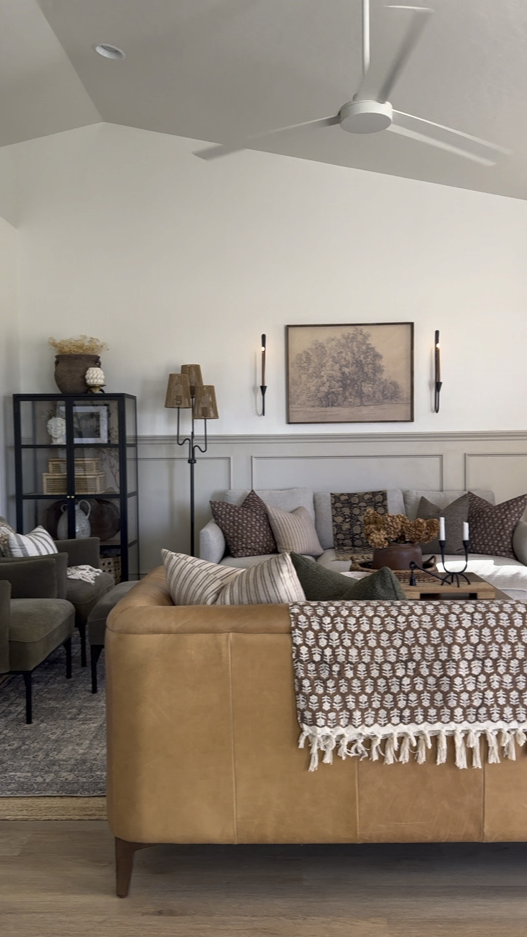 Living room inspo, custom curtains, pinch pleat curtains, floor to ceiling curtains, neutral sofa, beige sofa, west elm penn chair, green accent chair, vintage pillows, Turkish pillows, boucle pillow, shady lady tree, faux tree, greenery, Walmart floor lamp, woven table tray, square wooden coffee table, wall sconce, tapered candle holder, citrus tree, throw pillows, floor length mirror, arch mirror, Target home decor, affordable home, black cabinet, studio McGee cabinet, round glass coffee table, target accent table, vintage inspired rug, vintage milking stool, foot stool


#LTKSaleAlert #LTKHome #LTKVideo