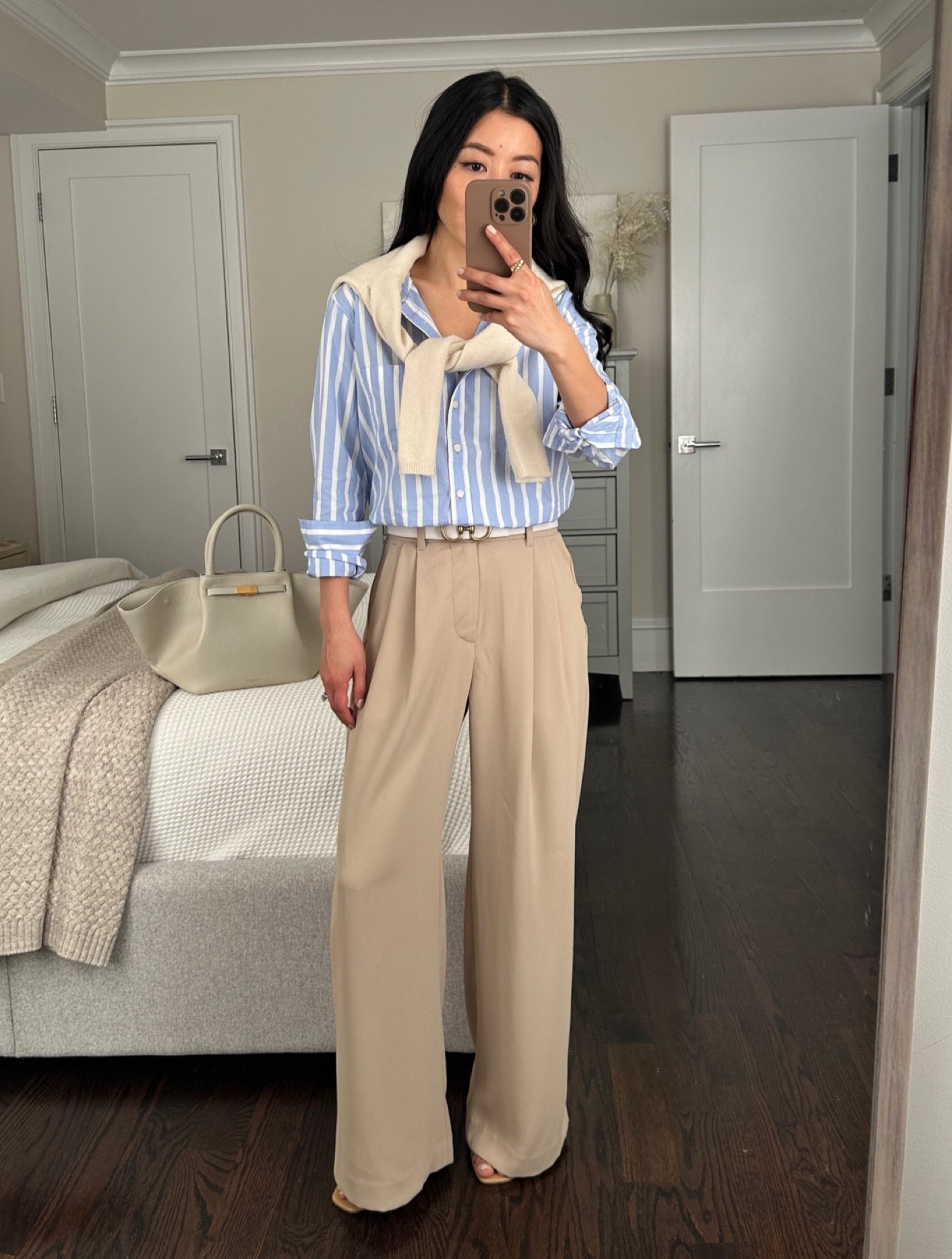 • Gap high rise pleated trousers in tan 00 petite - these fit a little big on me, which is typical for Gap sizing 00P measures 13" across the waist with stretch elastic back waistband, 11" rise, 27.5" inseam. loose fit through the hips and leg. I am 5 feet tall and wear these with a 2/2.5” heel. 

• Gap striped organic cotton shirt xxs petite true to size

• Demellier bag in cream 

• Edited Pieces belt xxs

#petite spring workwear 

@gap #ad #howdoyouweargap

#LTKworkwear #LTKSeasonal