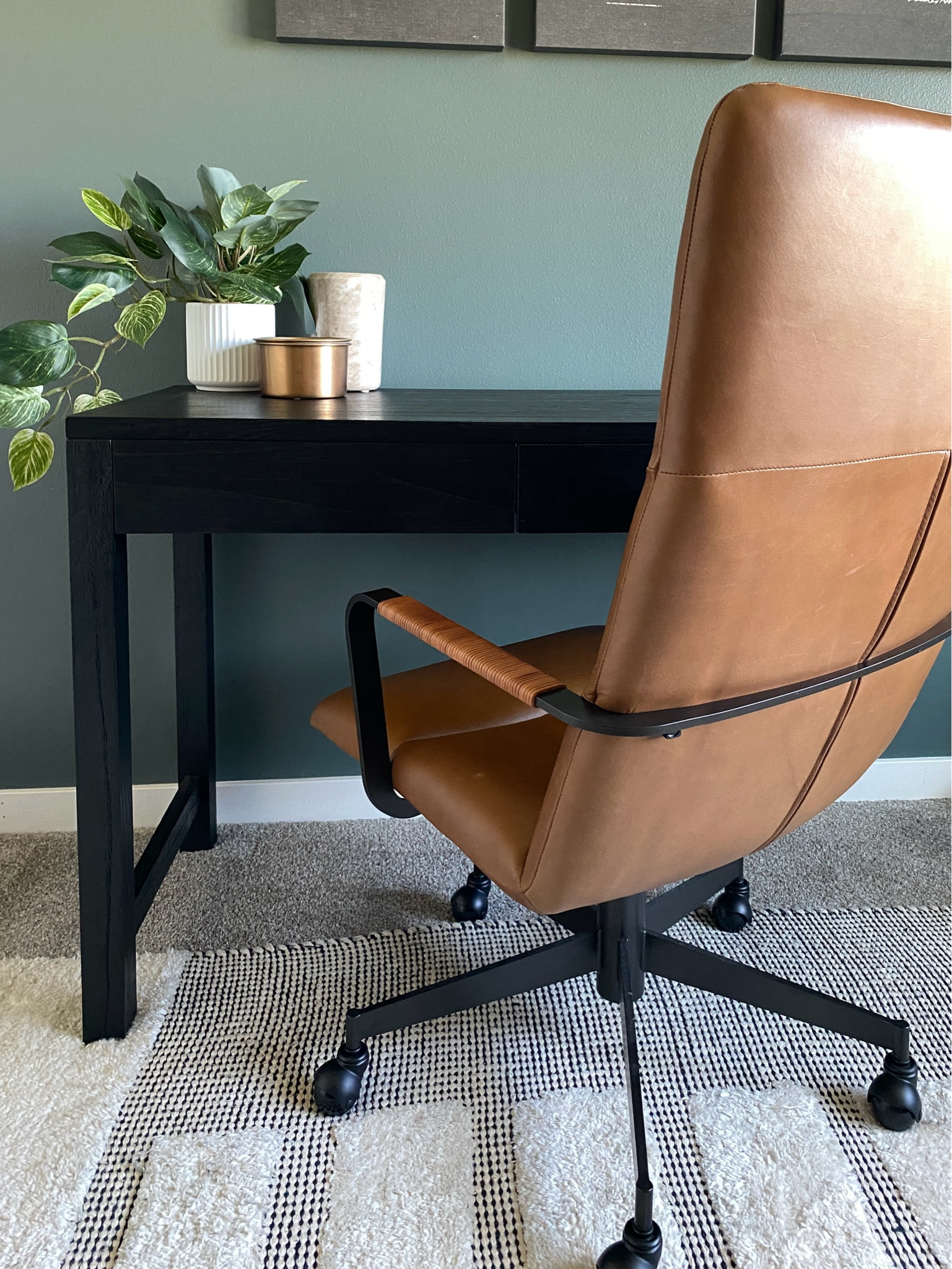 Gorgeous leather desk chair with caster wheels. Simple decor. Modern Minimalist. Faux potted plant, brass candle and marble utensil holder. 

#LTKHome