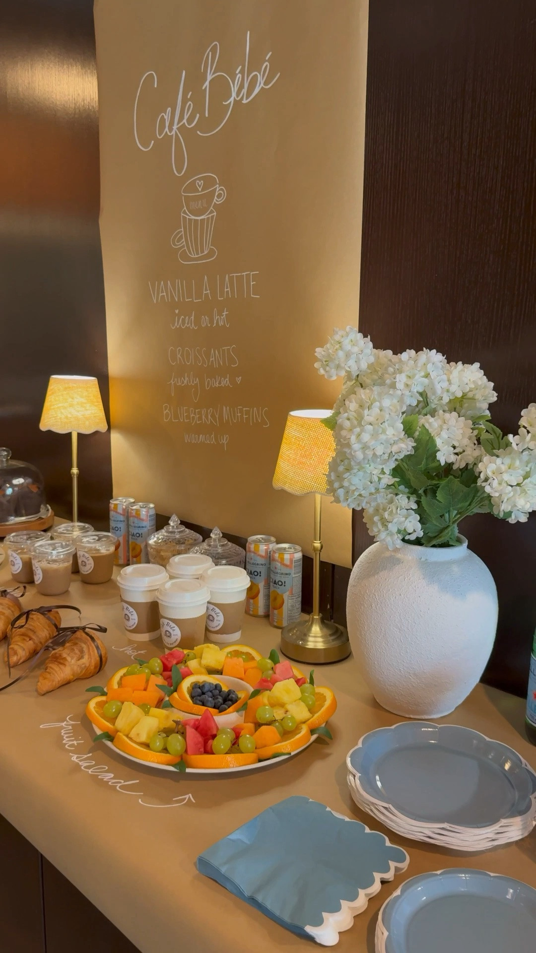 Baby Shower / 1st Birthday Party Theme Idea: Café Bébé 🥐☕️ Party details for making your own at home cafe! Custom coffee stickers to brand your party, cozy lamps for ambiance, plastic coffee cups for iced coffee, brown satin ribbon for croissants, faux hydrangea florals, kraft paper charcuterie board 🤎

#LTKsummer #LTKpartywear #LTKbaby