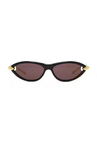 Bottega Veneta New Knot Sunglasses in Black, Gold, & Grey from Revolve.com | Revolve Clothing (Global)