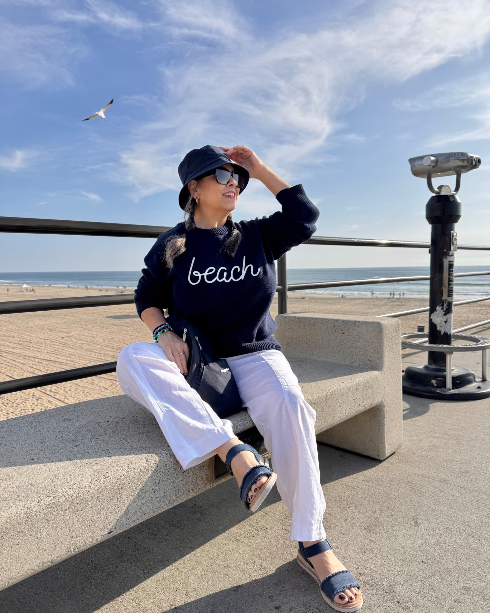 Sandy toes, cruise or tropical destination on your winter vacation itinerary? This sweater packs easily and looks great dressed up or down! The convenient #crossbody sling bag has four zippered pockets to carry travel essentials. #styletip #cruisestyle #vacation #coastal #beach #navy #sweater #sketchers 

#LTKTravel #LTKShoeCrush #LTKItBag