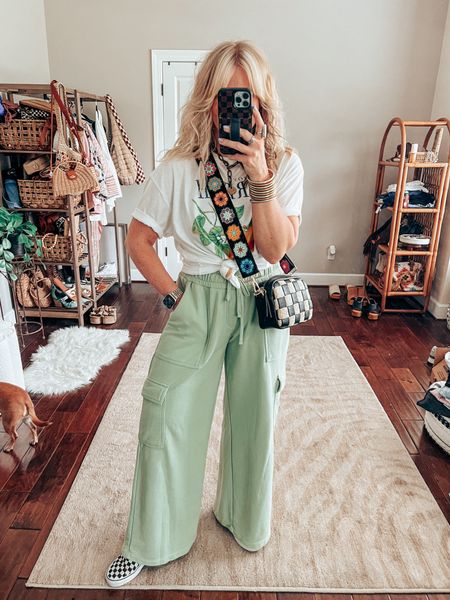 Targetstyle 🎯
•NECKLACE is TWISTED SILVER save with CODE MANDIE15 
•Cargo pants M 
•Tee M (size up for an oversized look)
•Vans sized down 
Checkered crossbody, crochet purse strap, checkered vans, cargo pants, graphic tee, summer style, casual style 

#LTKFindsUnder50 #LTKOver40 #LTKStyleTip