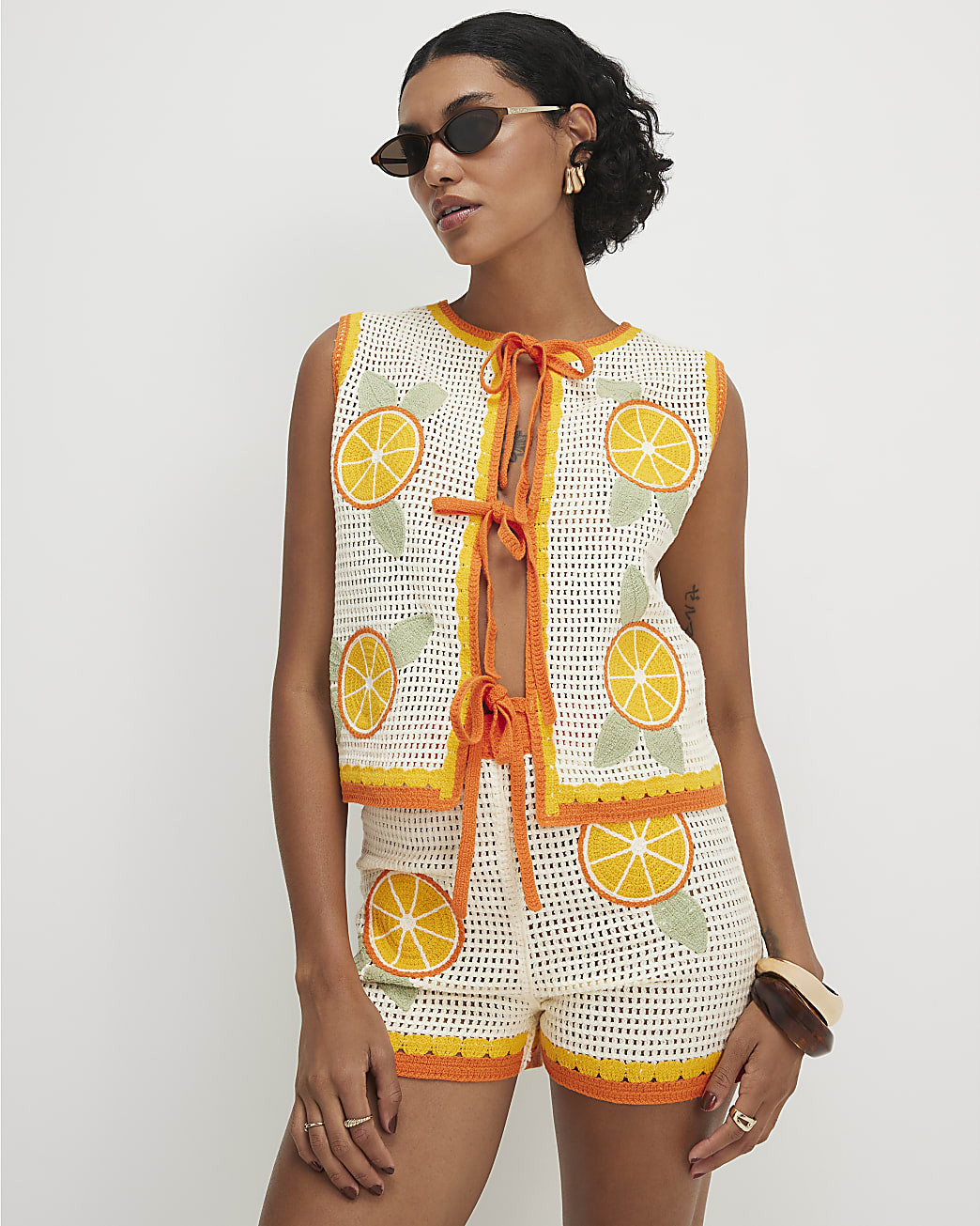 White Crochet Knit Orange Patch Shorts | River Island UK & IE