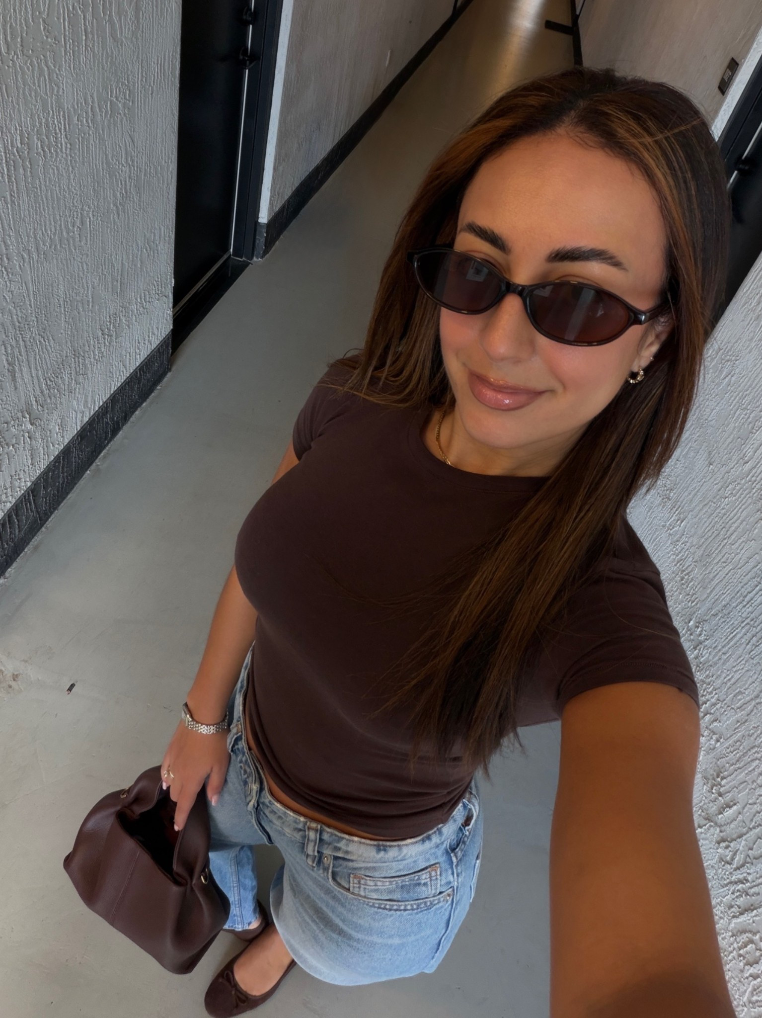 my go-to basics - my favorite ballet flats, t shirt, and jeans 🤎