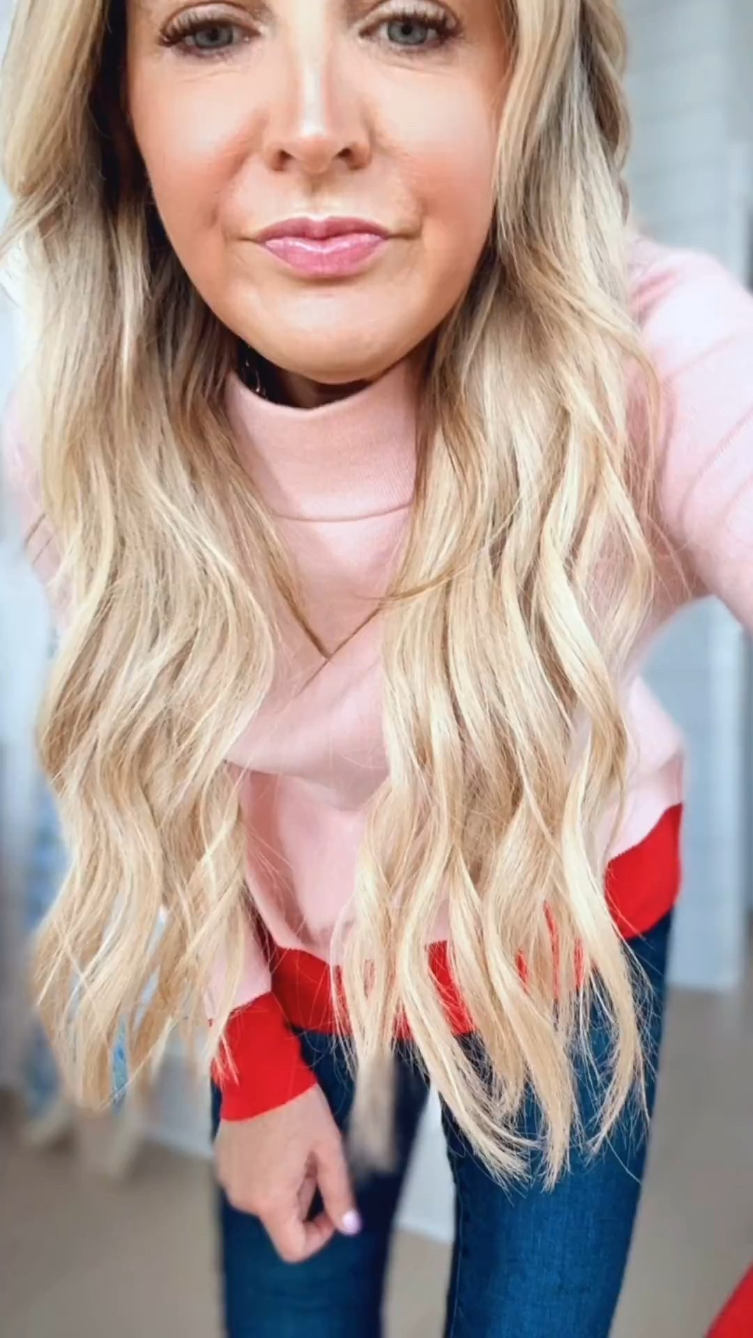 Her favorite sweater is now available in a pink with a red trim. This is so cute. I wear an extra small so perfect for the upcoming Valentine’s Day holiday and all of spring and summer. I have on these jeans and a size 24. 

#LTKSeasonal #LTKootd #LTKmomlife