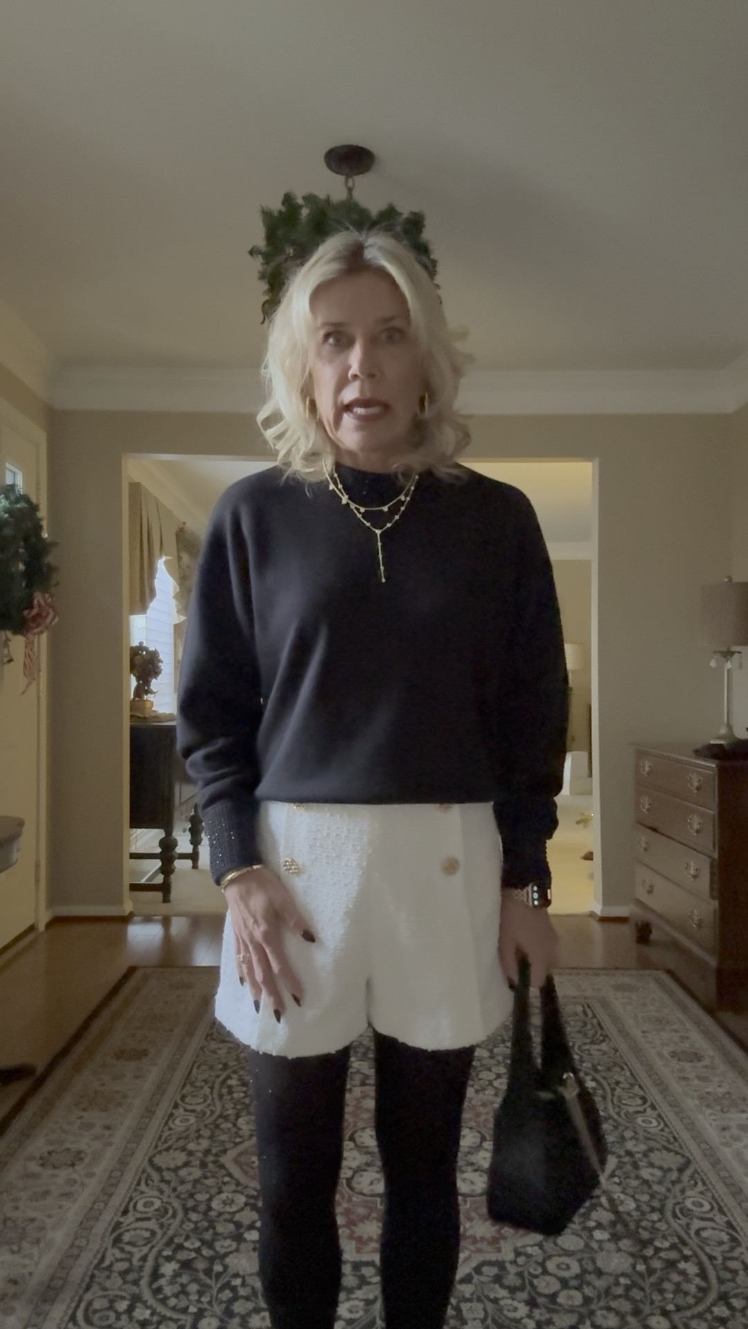 Christmas holiday winter casual chic outfit. Paired this crystal embellished over-sized sweater with winter white Boucher’s shorts with gold buttons. Added rhinestone embellished black tights and flats to add a bit of flair to the outfit. This could easily be eorn with blank knee-high boots and a blazer too.

#LTKFindsUnder50 #LTKOver40 #LTKHoliday