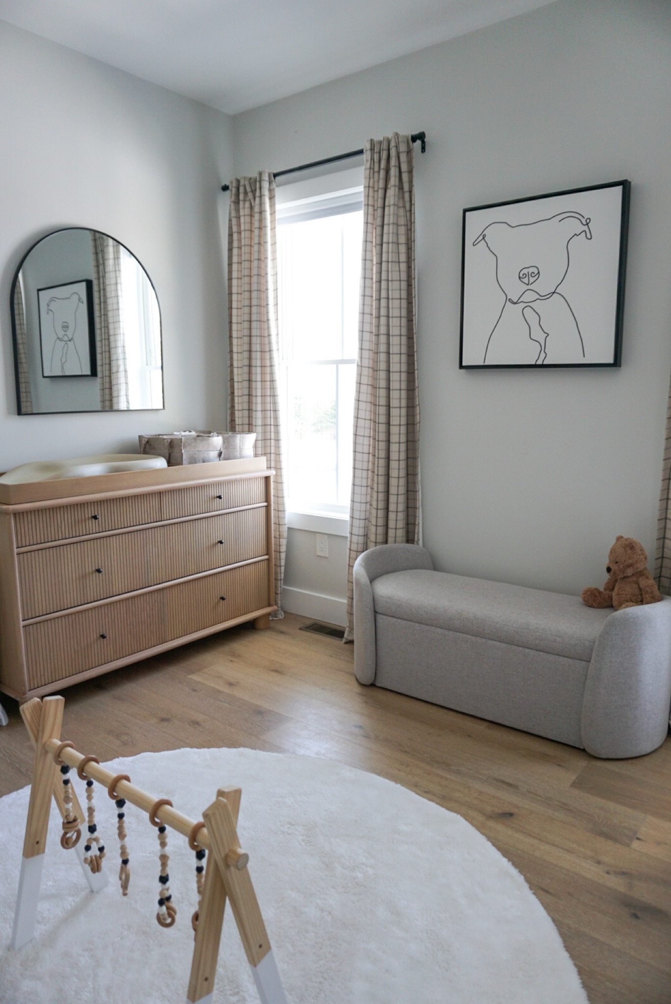 Baby boys neutral  nursery 🧸

• west elm, amazon finds, Etsy finds, baby room, plaid curtains, glider chair, changing table, washable rug, storage bench, custom details