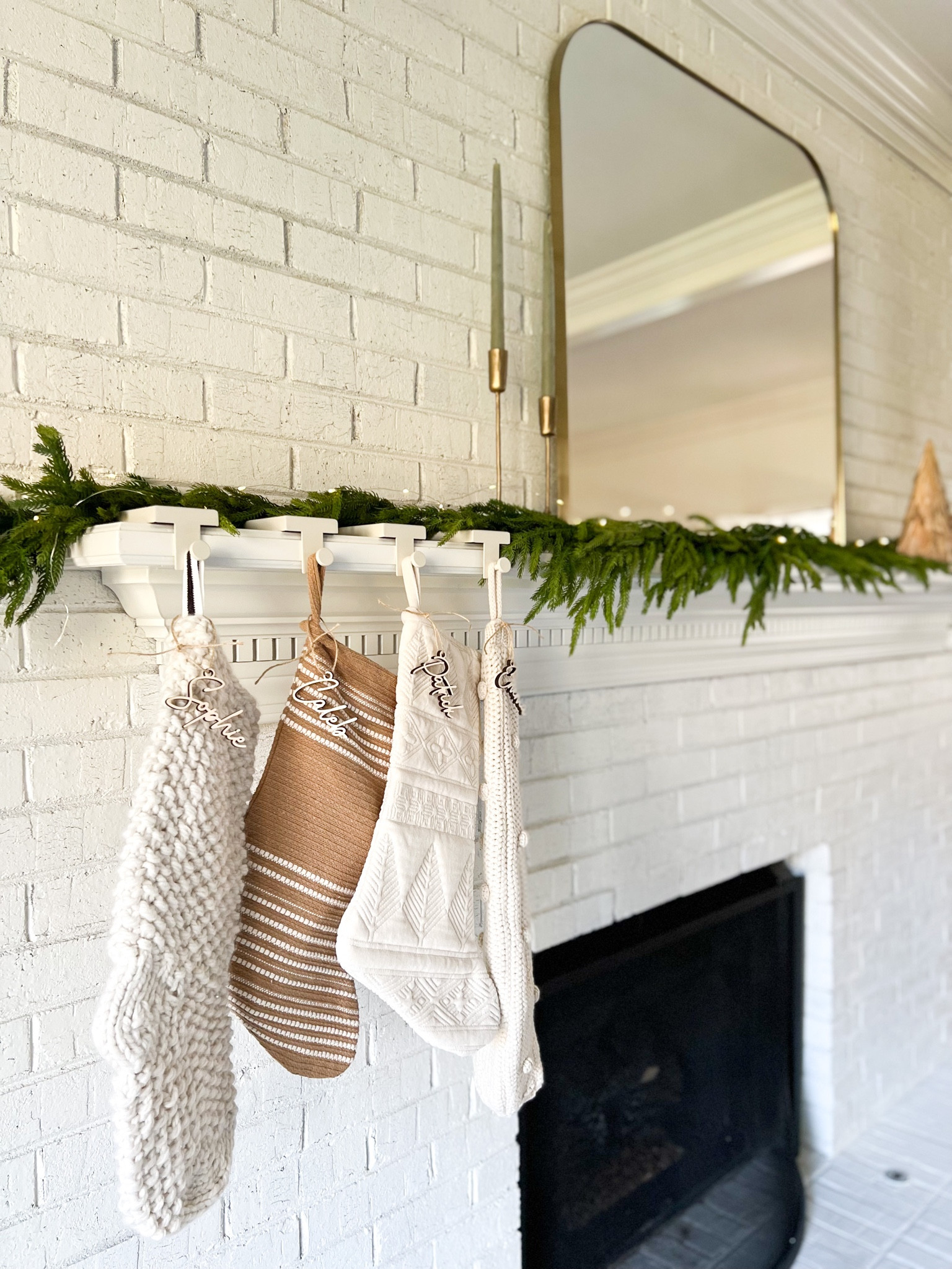 Christmas mantel and stockings 

#LTKHoliday #LTKGiftGuide