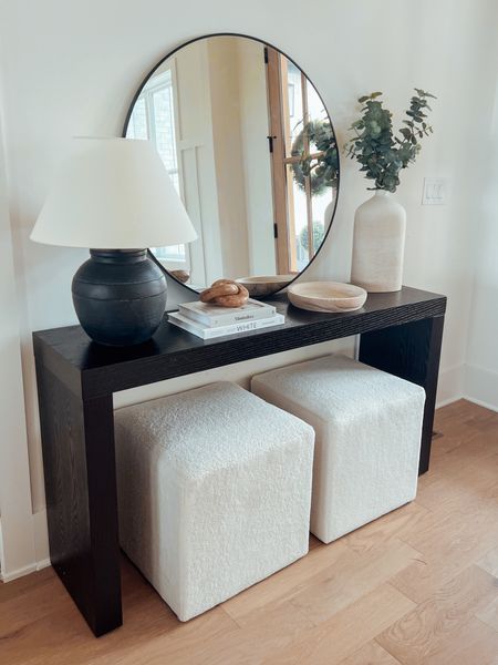 Entryway Table Decor ✨

Black entryway table, poufs, ottoman, black lamp, black round mirror, wooden decor bowl, faux stem vase, ceramic vase, 36 inch round mirror, modern entryway decor ideas 

#LTKhome #LTKstyletip #LTKFind