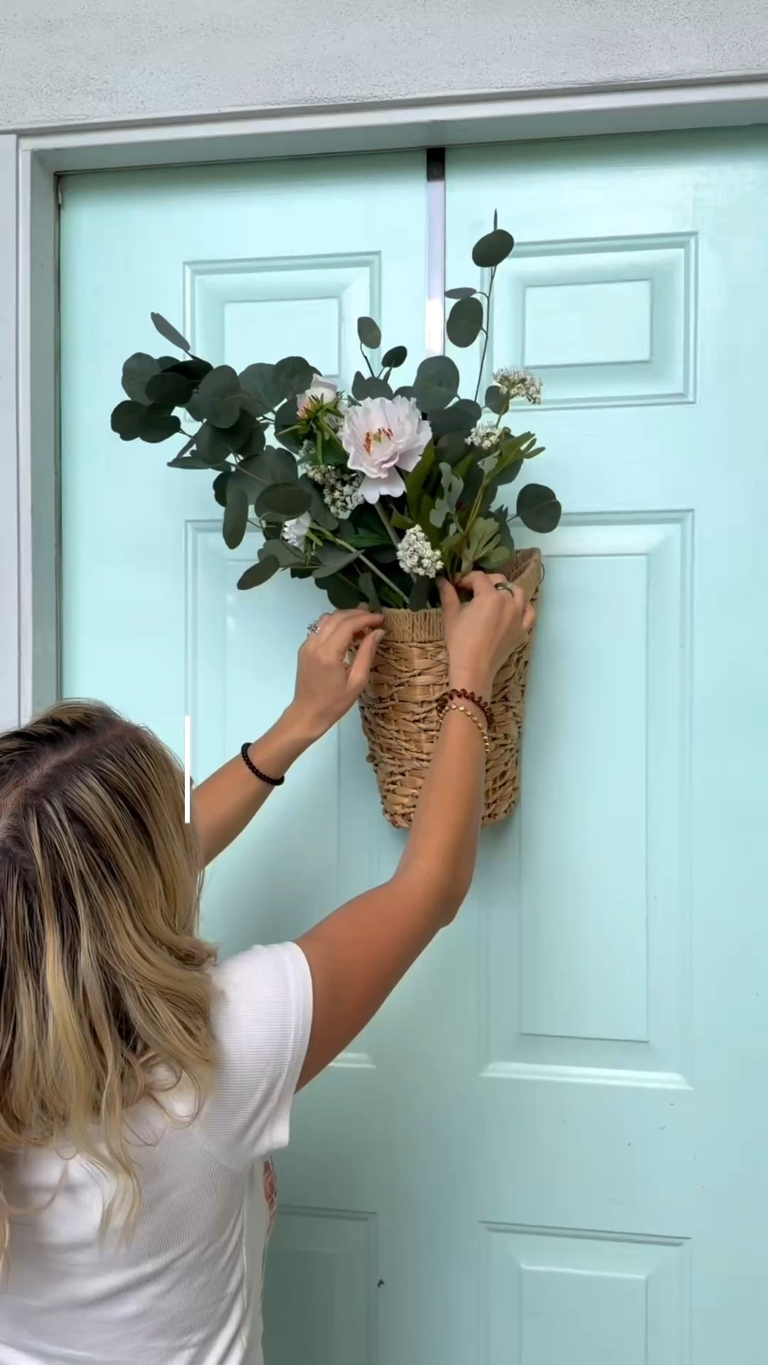 Front door flower basket decor for a spring glow up! So easy and fun to switch out the flowers for the season. Love both baskets but the smaller one fit our size porch better!

#LTKSpringSale #LTKHome #LTKSeasonal