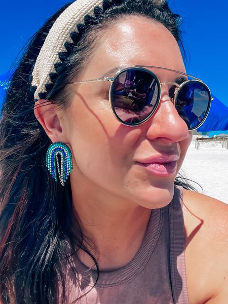 My favorite swim suit & summer accessories. OKC Thunder blue Crystal drop earrings also
Worn by Paris Hilton! Amazon Sunnies, and Target tank & raffia headband. Perfect for swim season- included my favorite ruffle & ruched floral one piece swim
Suit. Happy spring & summer pool season 😎🫶🏼🏝️


Swim 
Travel outfit 
Blue earrings 
Pink lipstick 
Sunscreen 

#LTKFestival #LTKswim #LTKparties
