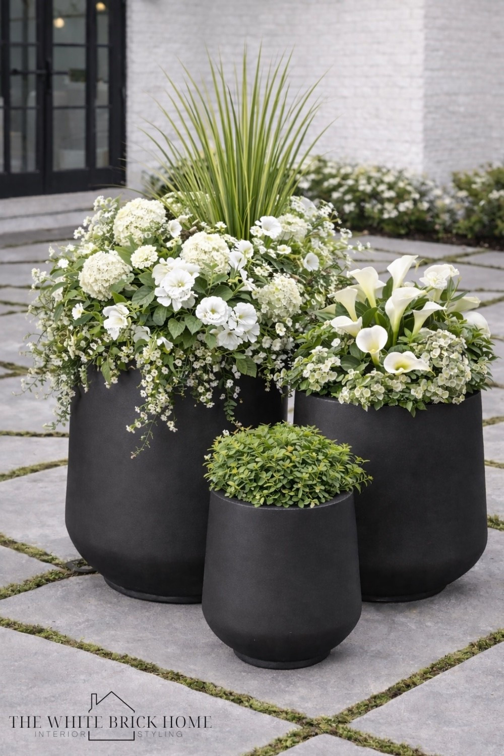 Sleek, modern, and budget friendly - these matte black planters instantly elevate your patio with a designer look for less! 
🖤🖤
Amazon, Amazon home, planter, outdoor patio, patio decor, patio planter, patio design, outdoor living, outdoor decor, porch decor, porch furniture, outdoor decor ideas, patio design, patio planters, outdoor planters, outdoor design, white and green flowers, modern traditional planters, Amazon, Amazon home design, Amazon home decor ideas, Amazon outdoor. 


#LTKHome #LTKSeasonal #LTKSaleAlert