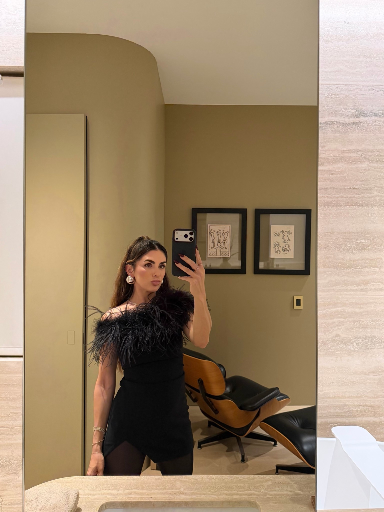 Outfit change into a Giuseppe de Morabito feather mini dress, Retrofete earrings, Amazon tights, and silver platform heels. 

#LTKSeasonal #LTKU #LTKFindsUnder100