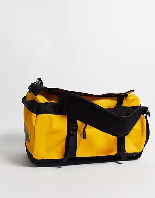The North Face Base Camp 31l small duffel bag in yellow and black | ASOS (Global)