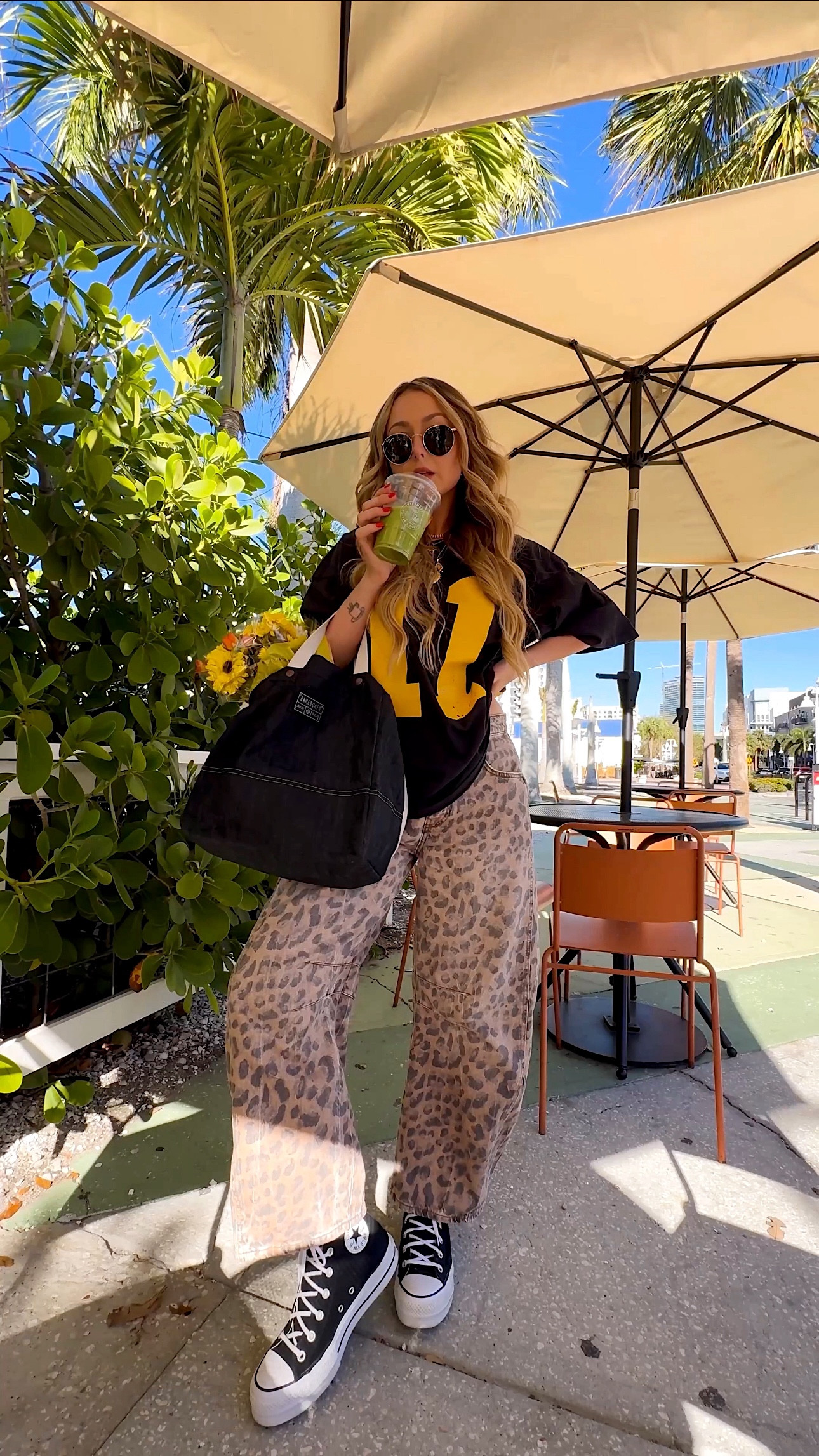 A cute tee and baggy jeans - doing my favorite things: thrifting and a mid week pick-me-up (💐🧡 fresh flowers for the house and an iced matcha) Both looks styled with my Bare Bones Living bags!! Their new wax denim collection just dropped and they’re PERFECTION. I use them all the time for thrifting, errands, farmer markets, traveling etc! 

Size M in the tee: code Nicole15 for $$ off

Size 28” in both jeans





#LTKStyleTip #LTKFindsUnder100 #LTKWatchNow