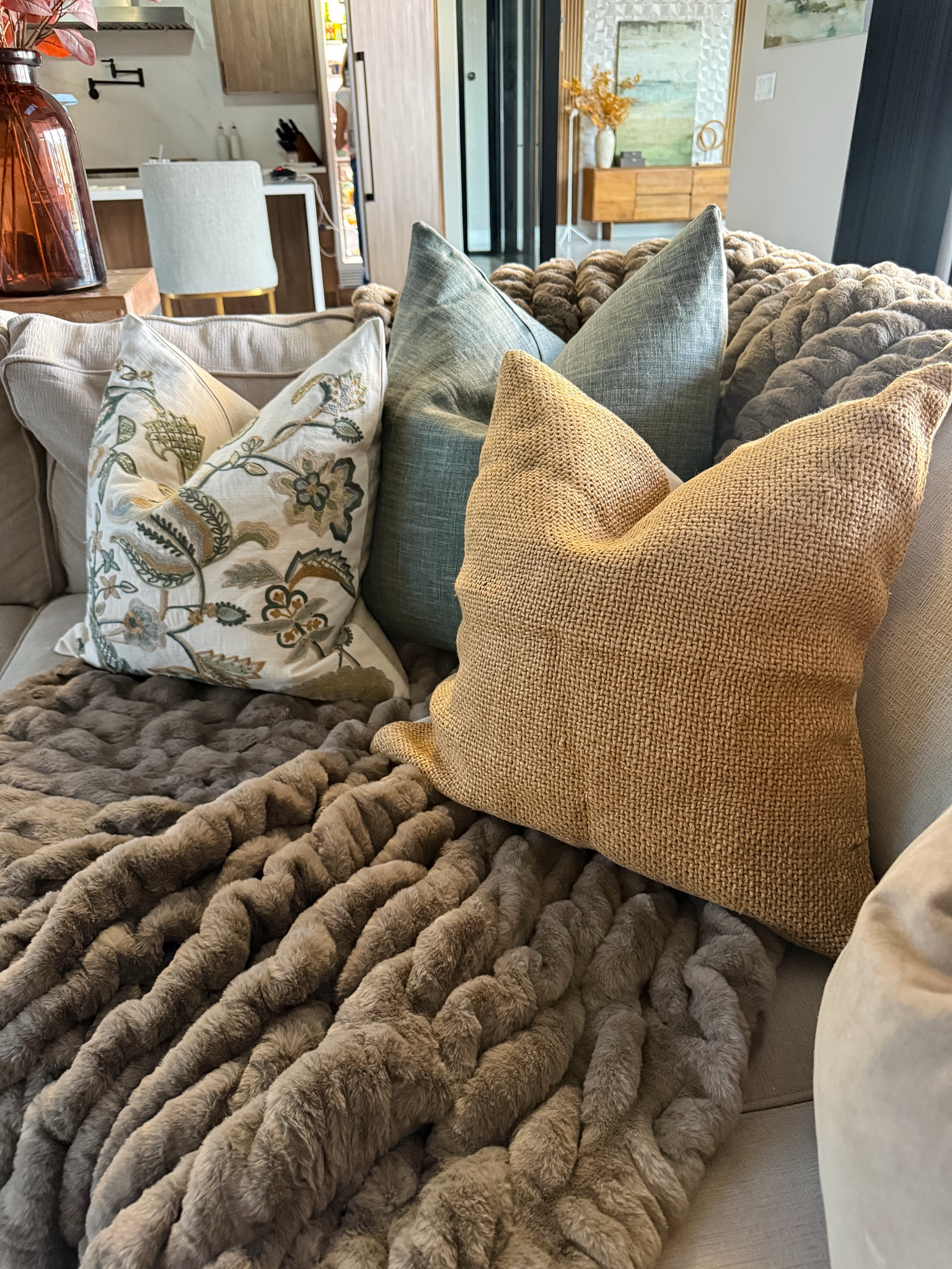 Cozy season has officially taken over the couch 🍂 Layered pillows + the softest chunky throw make the whole room feel ready for fall. #FallDecor #CozyHome

#LTKdayinmylife #LTKSeasonal #LTKHome