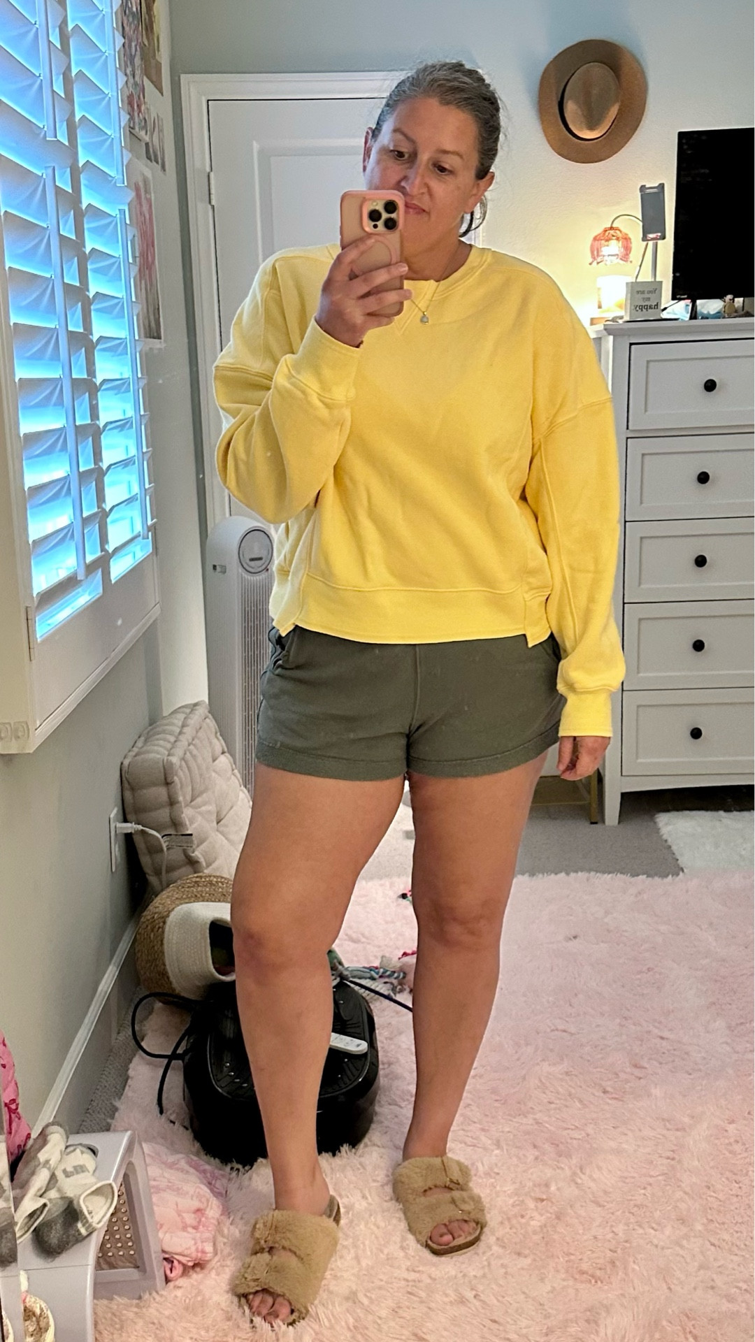 Lemon yellow sweatshirt for Spring paired with my aerie comfy shorts and I’m obsessed with my fuzzy slides….this is my OOTD 

#LTKMidsize #LTKOver40 #LTKootd