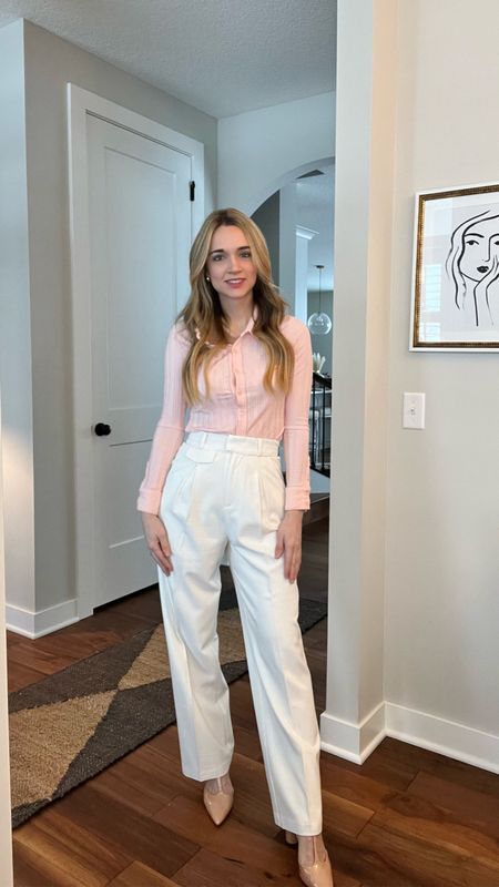 This pink polo top is a closet staple of mine. I paired it with these white dress slacks from LPA for a casual Tuesday work outfit. The top is no longer available, but I’ve linked up some cheaper, similar options. 

#lpa #revolve #womensworkwear #workoutfits #womensfashion #style #ootd #workfromhomeoutfits

#LTKstyletip #LTKshoecrush #LTKworkwear