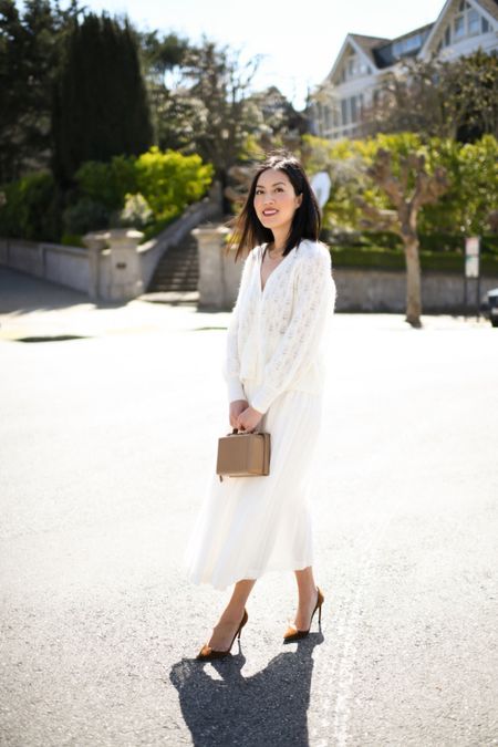 Ivory summer outfit - open knit sweater and pleated midi skirt

#classicstyle
#monochromaticoutfit
#summeroutfit
#summerworkwear
#smartcasual

#LTKSeasonal #LTKWorkwear #LTKStyleTip