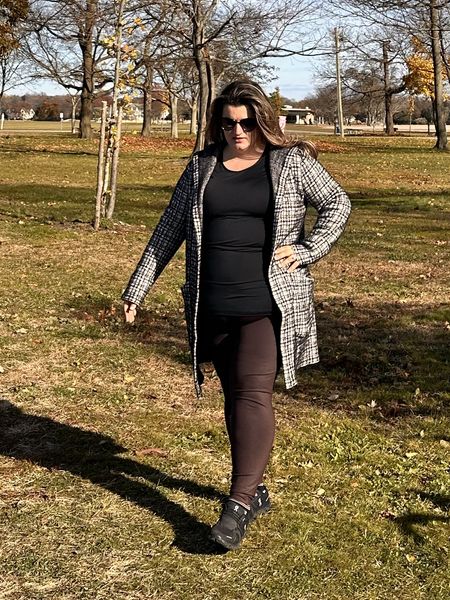 My favorite brown leggings. I wear them to work, to the park, and to go out. I paired them with a checkered fleece sweater cardigan, a dry fit black Nike top. Everything is size large. Wearing On sneakers size 7  (you can size up in these). And fendi cat eye black sunglasses 

#LTKsalealert #LTKfindsunder100 #LTKCyberWeek