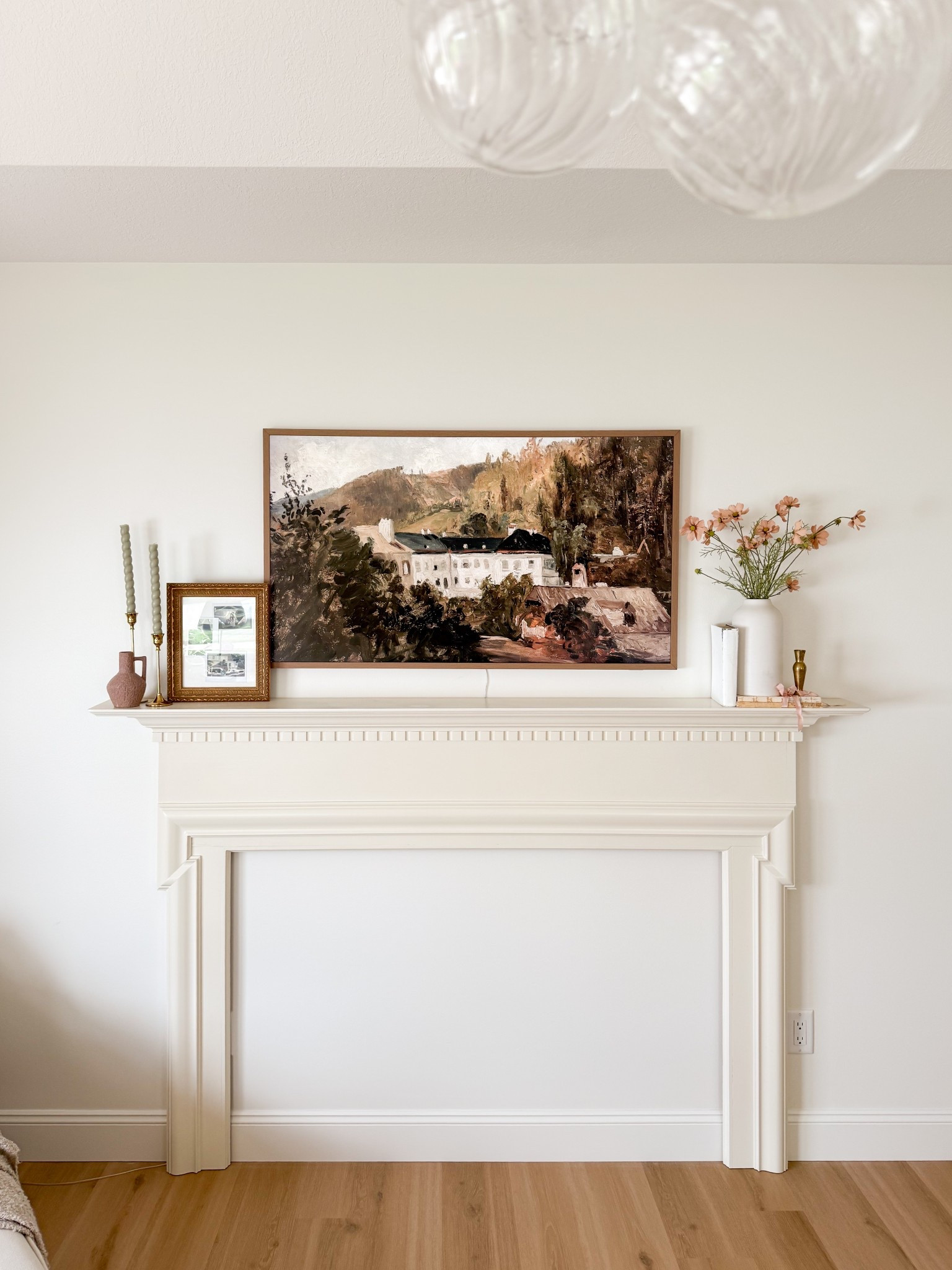 Antique Fireplace Mantle Styling for a Cozy Neutral Bedroom

If you’re looking for Frame TV styling ideas or a budget-friendly way to elevate your bedroom, this one’s for you! We installed a thrifted antique fireplace mantle in our primary bedroom and styled it with a mix of neutral decor, vintage books, and brass accessories to create a cozy, timeless look.

The mantle was a secondhand find we painted in a soft white tone, and it now serves as the perfect anchor for our Frame TV. I added thrifted home decor—like stacked antique books and brass candlesticks—plus framed Polaroids of us to make it feel personal and warm.

I’m linking similar affordable home decor finds below to help you recreate this classic look—perfect for mantle styling, TV wall decor, or neutral bedroom inspiration.

Shop the look:
	•	Frame TV + neutral bezel
	•	Brass candle holders
	•	Vintage-look book bundles
	•	Picture frames for Polaroids
	•	White paint color rec
	•	Faux fireplace mantles (similar finds!)

#mantledecor #frametvdecor #neutralbedroom #vintagehomedecor #thriftedhome #fireplacemakeover #ltkhome #ltkstyling #diybedroomdecor #homedecorideas #classicinteriors #affordablehomedecor

#LTKStyleTip #LTKHome