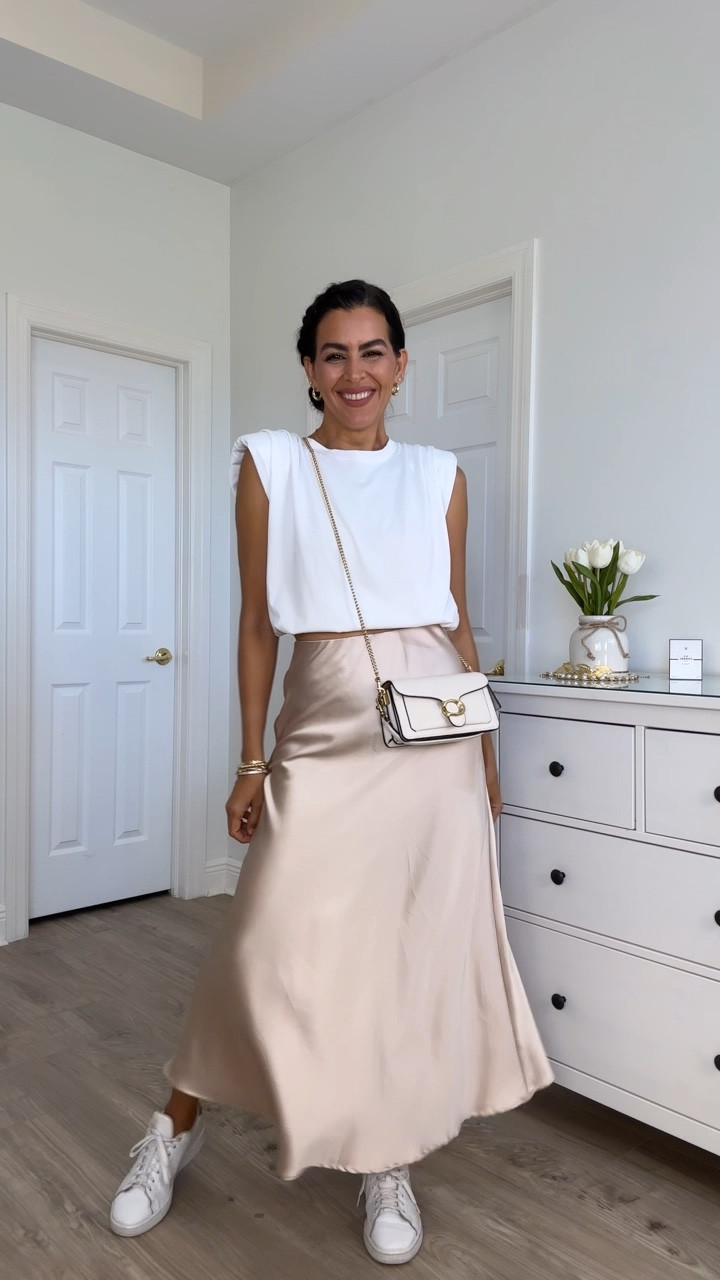 Wearing a size small in color Champagne 02, in  the skirt. Also available in many more colors. Size small in tops. Shoes are true size. Adding an extra chain strap for the bag. Lipstick color is: Rosy  mauve.

 I am 5’7” | 126 pounds 

#LTKVideo 

#LTKSeasonal #LTKU
