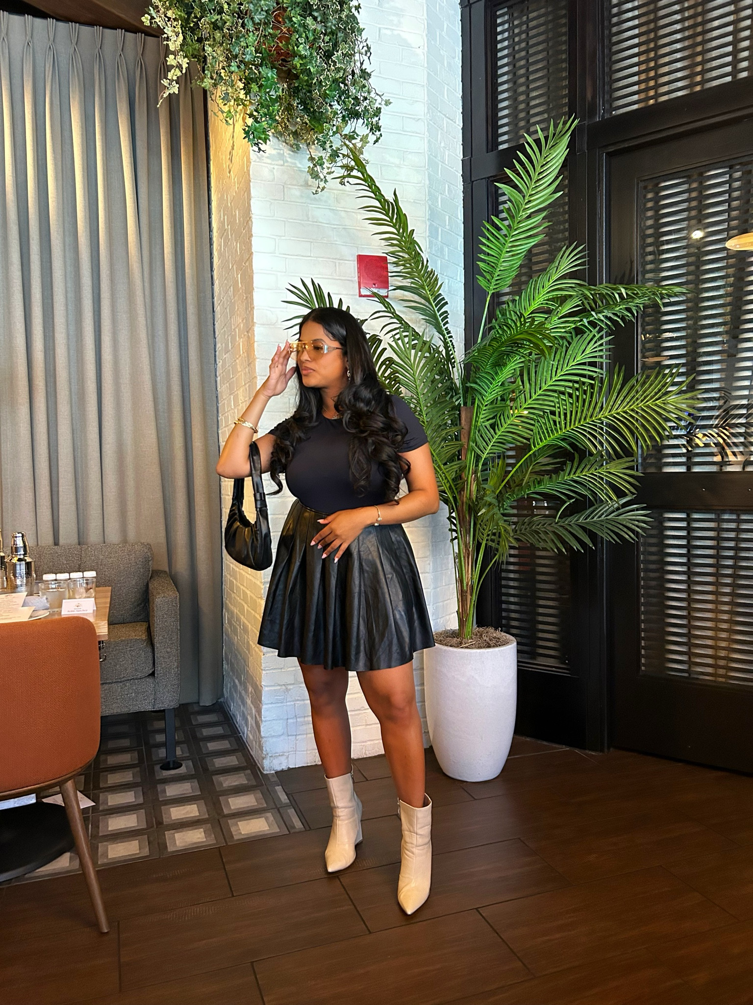 All Black Classic fit for the fall! Loved this look in Chicago! Black bodysuit, faux leather pleated skirt and creme booties! #allblackoutfits #fallfits 

#LTKSeasonal #LTKfindsunder50