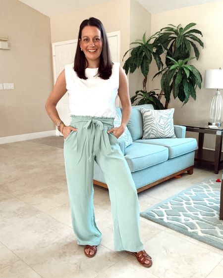 Spring outfit idea with wide leg pants and a white tank. Runs true to size -
I’m wearing a small in both.  Pants would be great for a teaching outfit too!



#LTKover40 #LTKstyletip #LTKfindsunder50