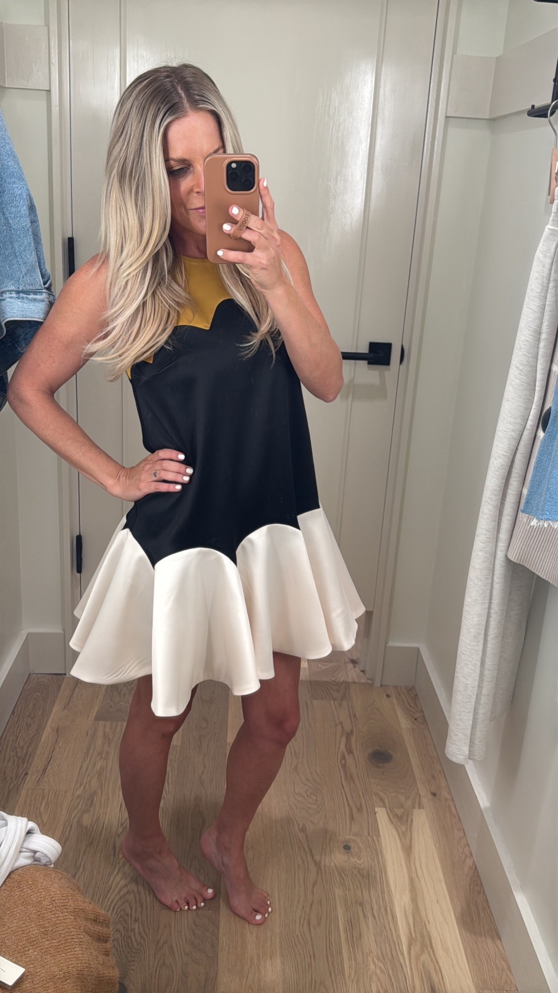 How cute is this mini dress?! I totally fell in love with the color blocked detailing and ruffled hem. I also like the higher neckline 👏🏼 Wear this on a date night or girls night out! 

#LTKStyleTip