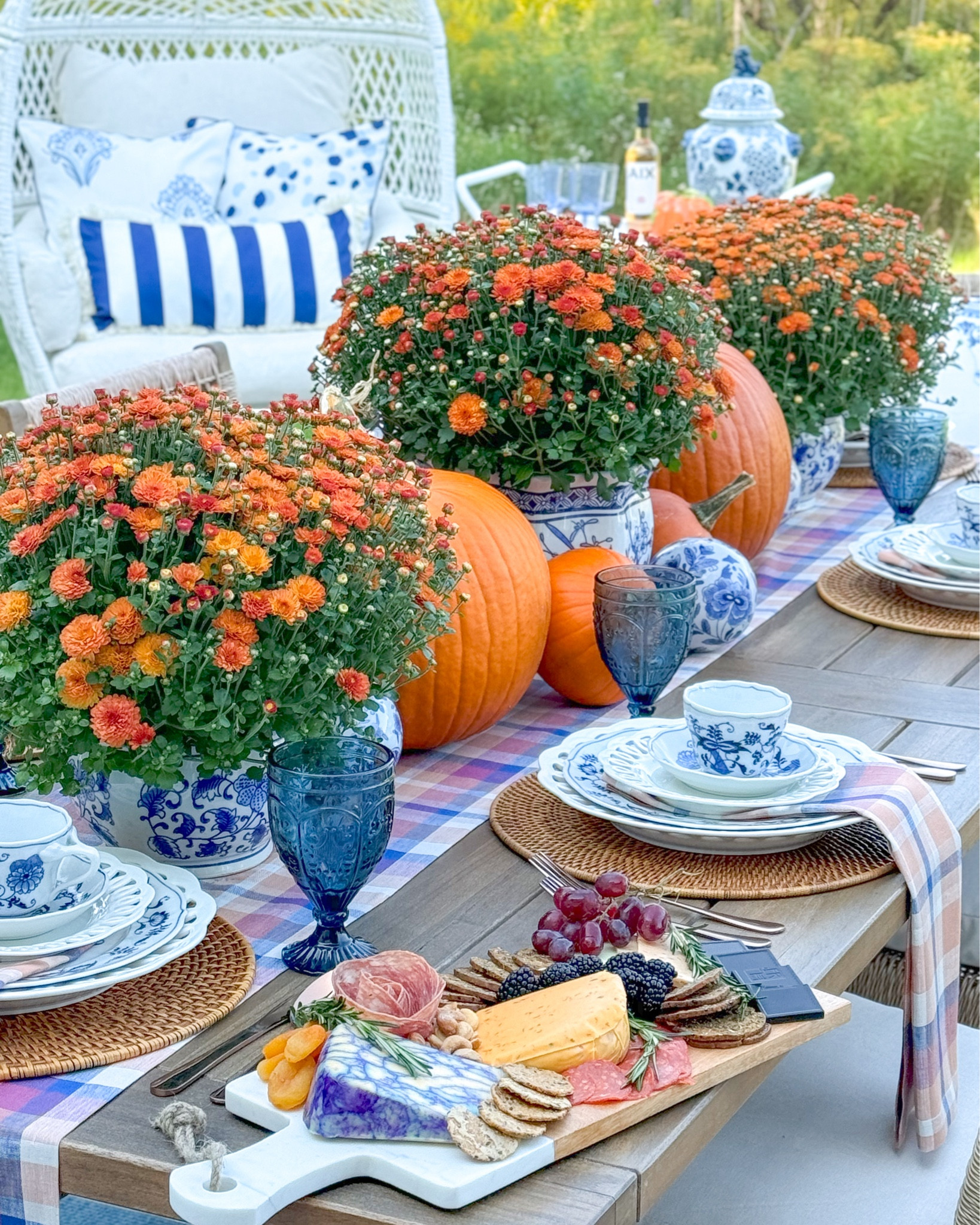 Shop my “Chinoiserie meets Plaid” fall tablescape! 

Blue Danube china, blue and white plates, orange plaid, fall plaid, orange mums, orange pumpkins, woven chargers, charcuterie board, fall entertaining, fall table, fall patio, fall decor, fall porch, blue goblets, Williams Sonoma, blue and white pillows, chinoiserie planters, teacups 

#LTKHoliday #LTKSeasonal #LTKHome