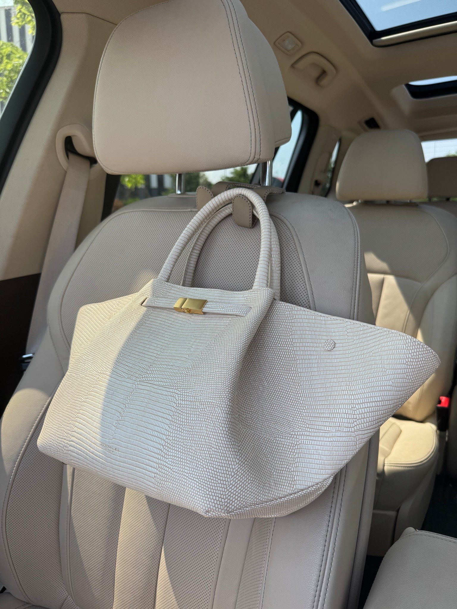 My new summer bag & my favorite little hanger from Amazon to hold my bag while driving! It’s especially helpful. 