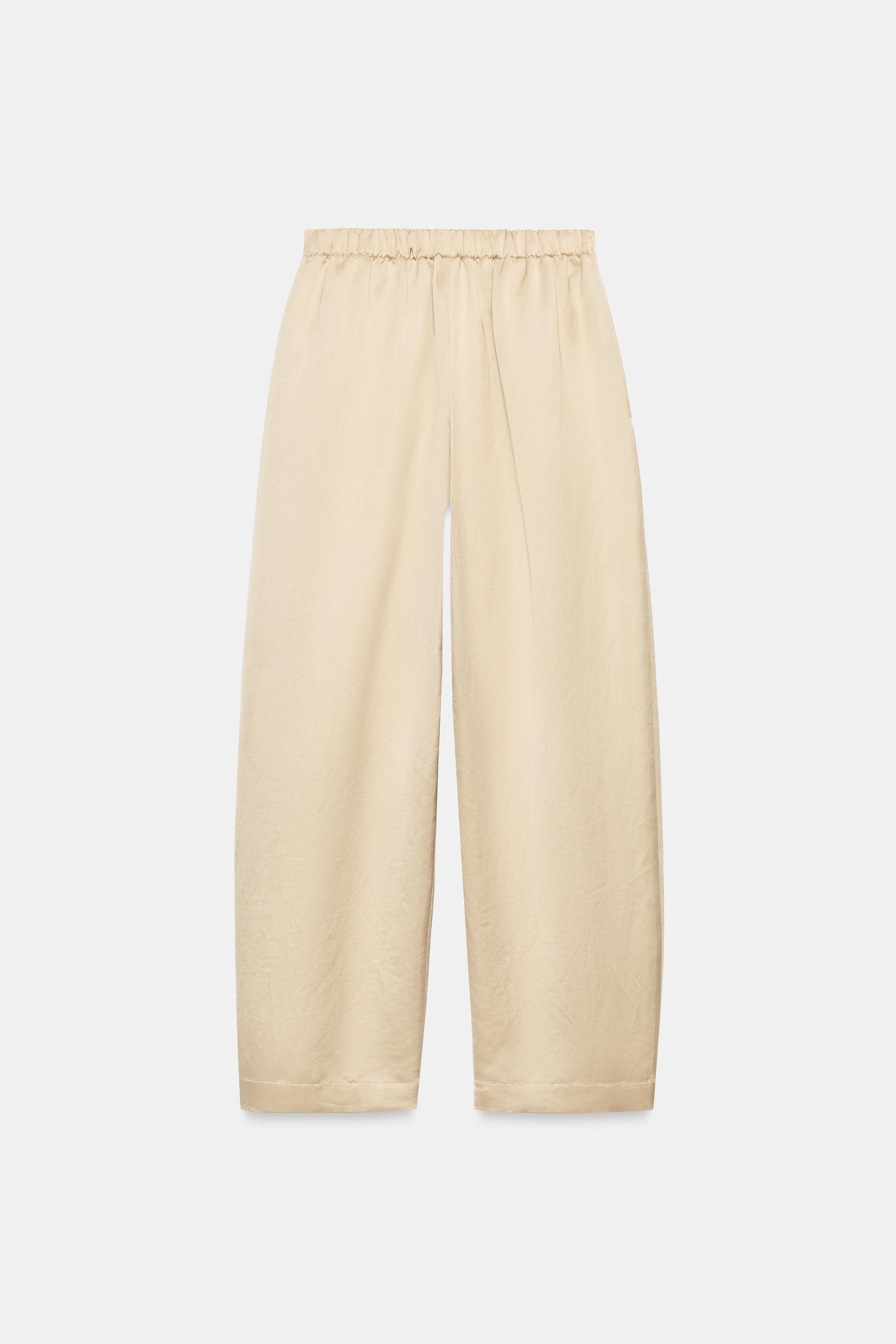 ZARA WOMAN COLLECTIONTrousers made from a fabric containing 24% linen. Mid-rise with an elastic w... | Zara US