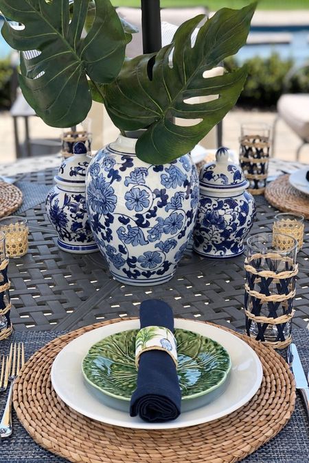 Blue and white ginger jars on a tropical table setting.

#LTKstyletip #LTKSeasonal #LTKhome