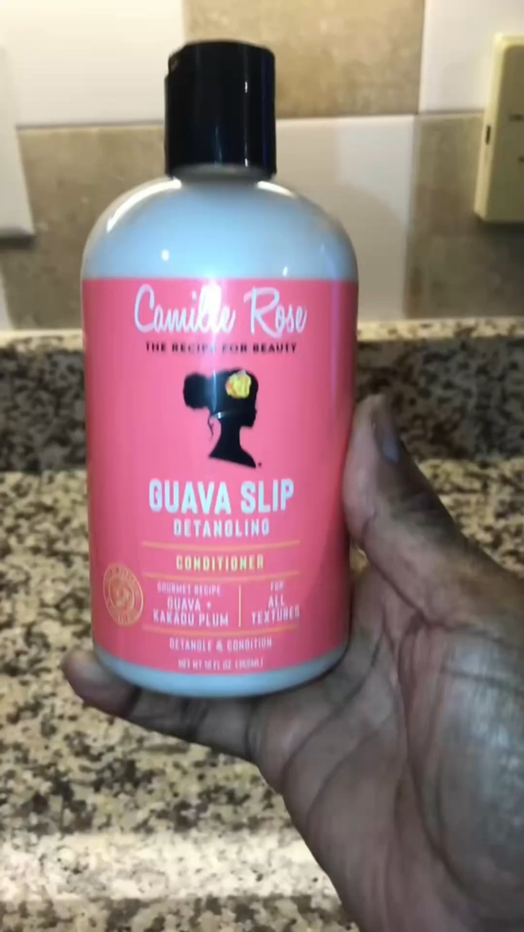 I love my curly hair but I don’t love the tangles when I condition  it. The Camile Rose Guava slip conditioner makes conditioning my hair very  easy.  It has so much slip that it detangles my hair. It smells edible and it rinse out clean.  It’s perfect for anyone.  Click the link and make it yours today.  Follow me for more content.  @camillerose #detanglingconditioner #haircare #conditionerwithslip #Ltkbeauty