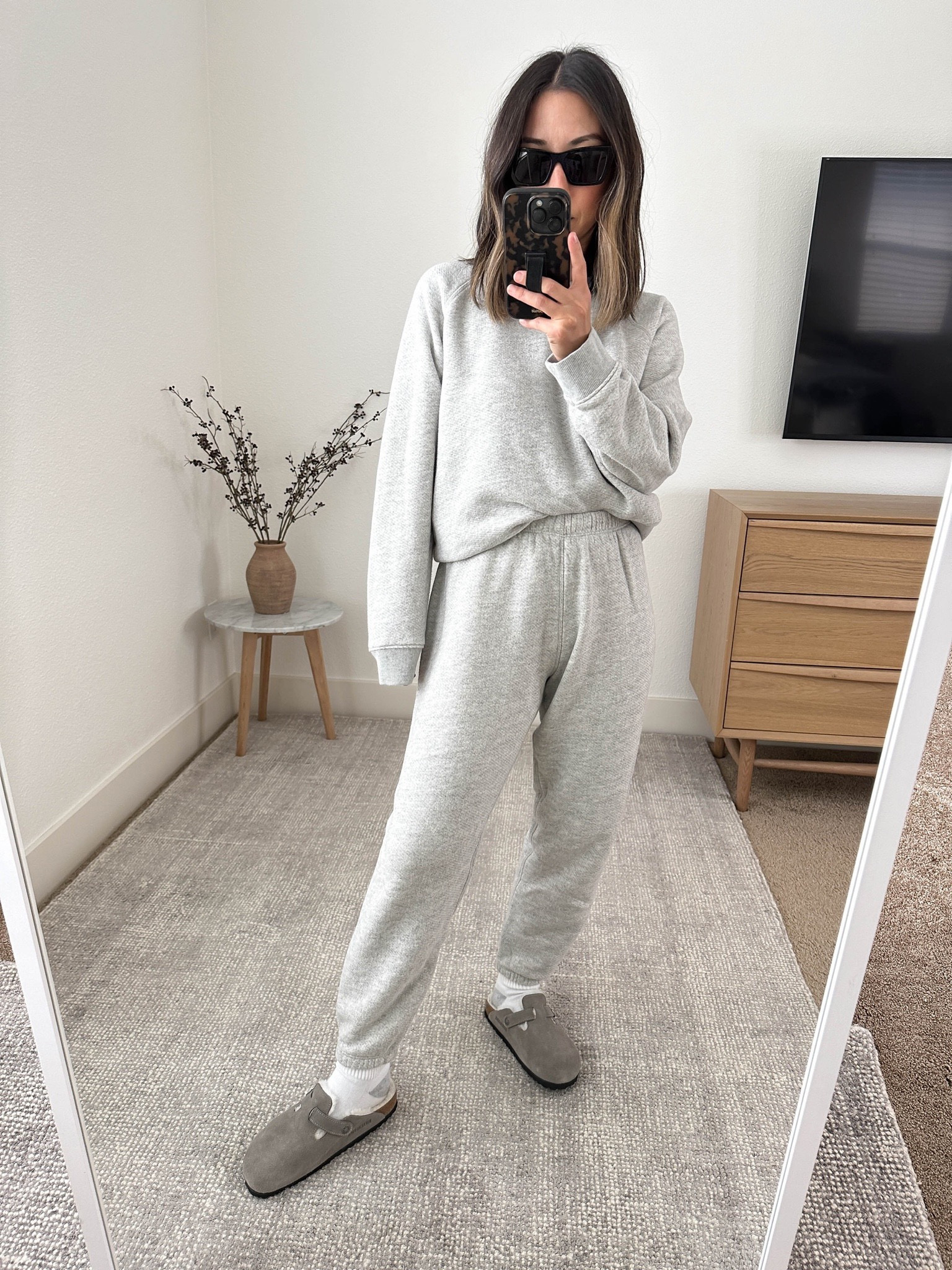 How to style shearling Birkenstock clogs. Love this grey color so much. I’ve sized up due to the shearling. 

Jenni Kayne Saturday sweatshirt medium 
Jenni Kayne Saturday sweatpants xs
Birkenstock Boston clogs 36
Hanes socks
YSL sunglasses 

Fall outfits, athleisure, petite style


#LTKSeasonal #LTKstyletip #LTKshoecrush