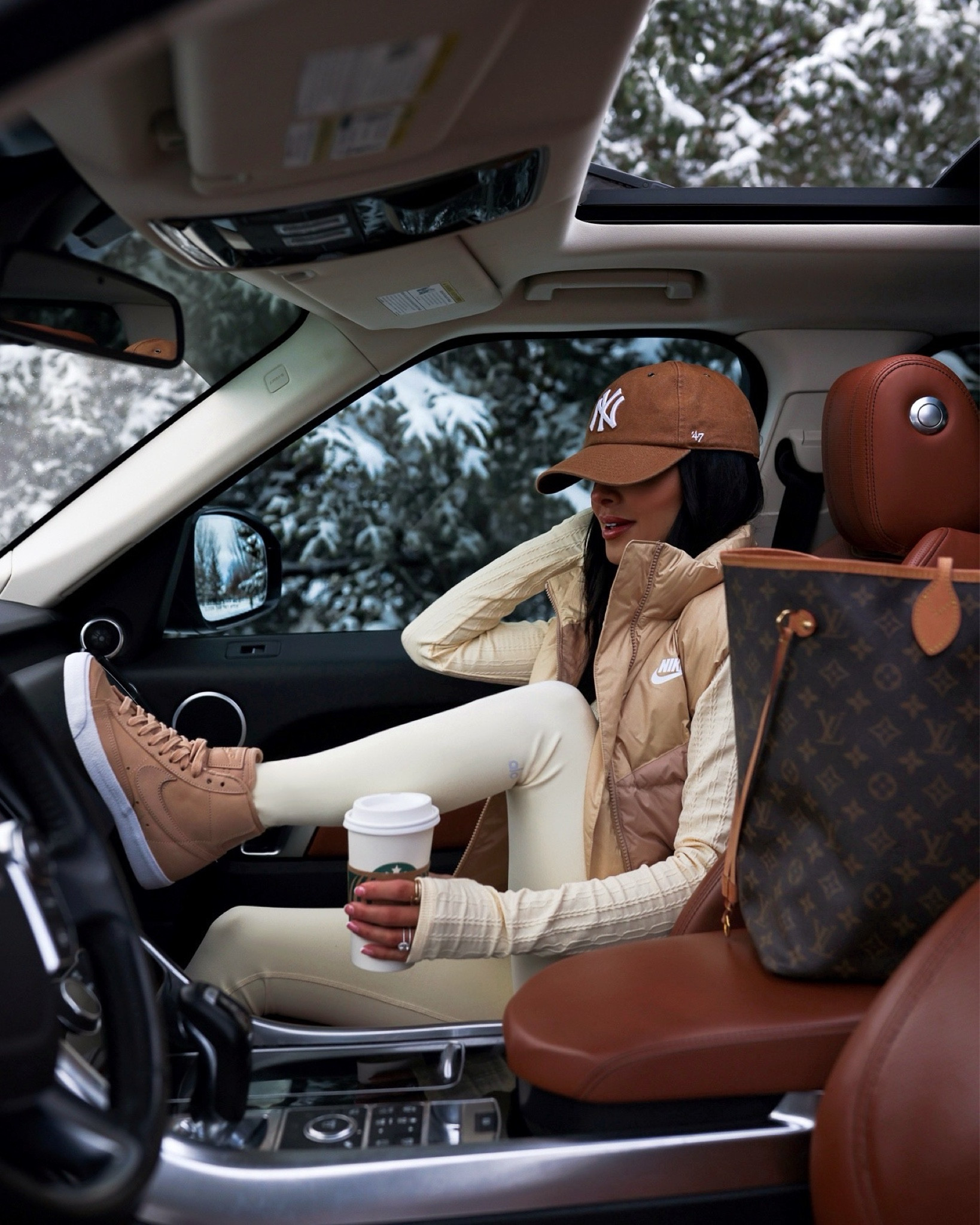 Winter outfit ideas / apres ski chic outfit on sale 
Nike puffer vest 
Alo leggings on sale 
Nike blazer sneakers on sale 

#LTKfindsunder100 #LTKfitness #LTKsalealert