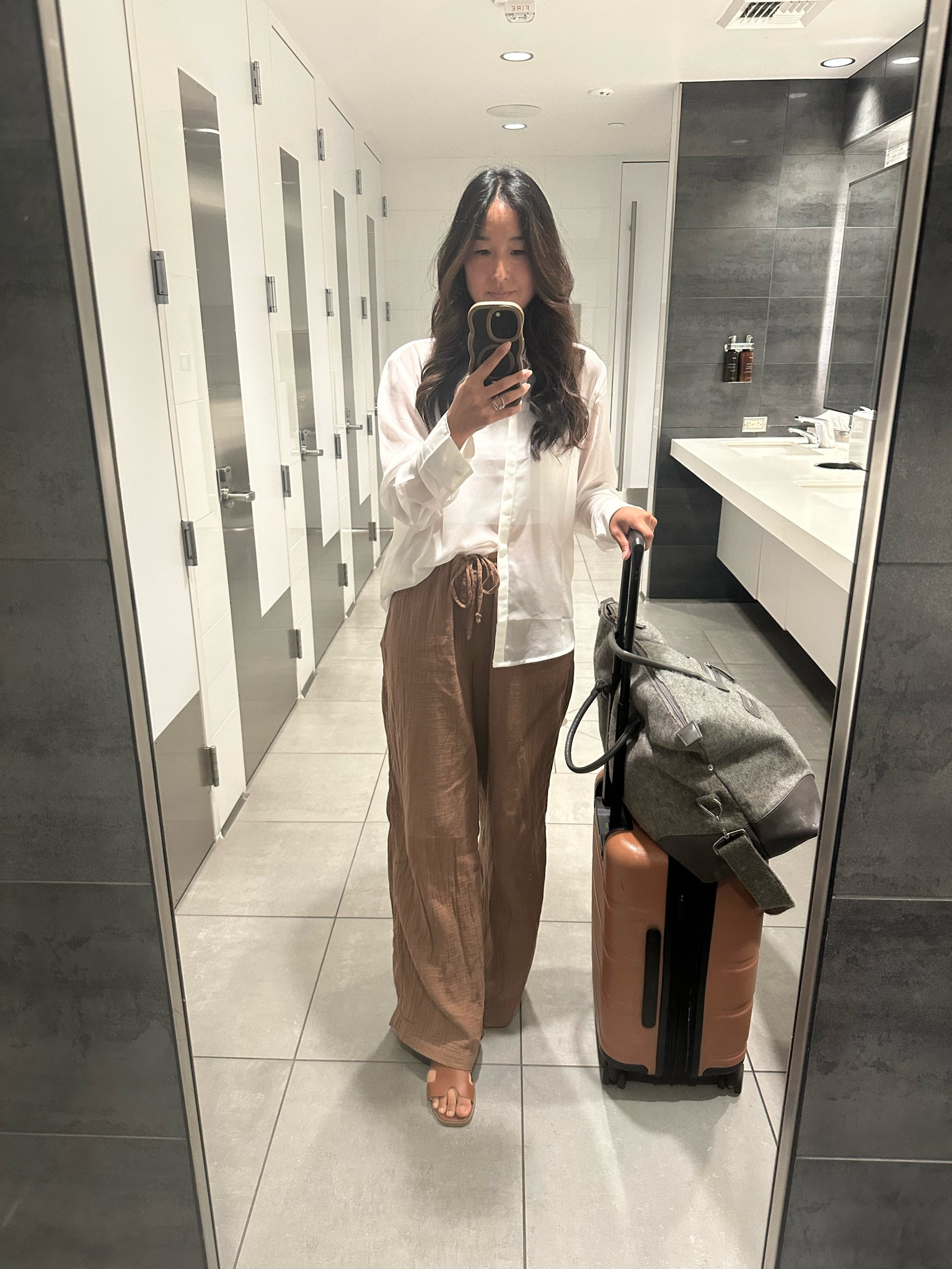 This has got to be one of my favorite travel outfits. It’s comfy but looks sophisticated. It give business class vibes with pj level comfort. Pro tip. I always bring my collapsible weekender bag because it has a zipper so I can throw everything into it and be certain it’s secure. #target

#LTKootd #LTKTravel #LTKWorkwear